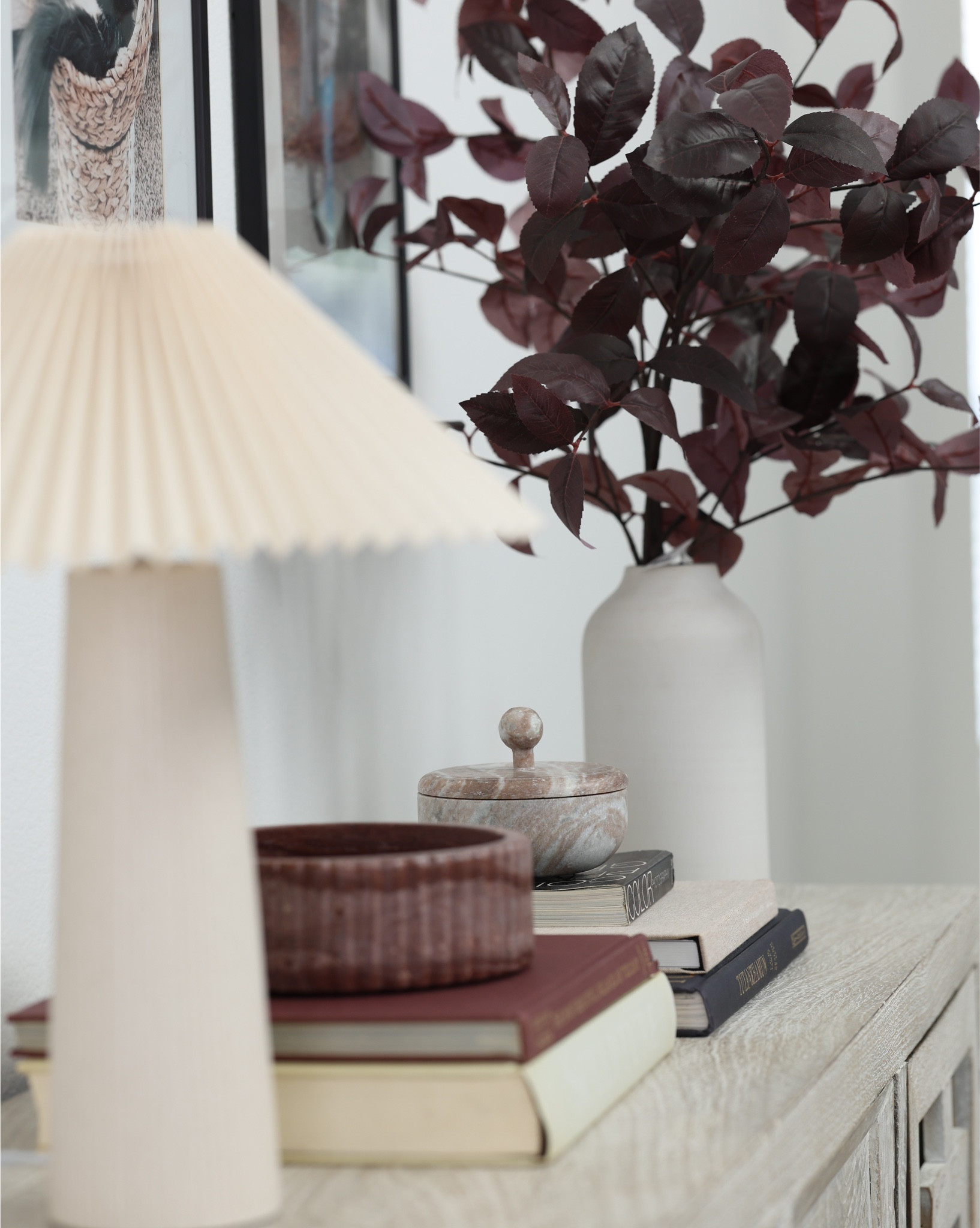 Modern Organic Living: Styled Moments
Every detail counts in creating a space that feels calm, curated, and cozy. Layered books, textured ceramics, and sculptural accents bring depth to this warm neutral living room. Fluted finishes, plum branches, and checkered decor add a subtle nod to fall without feeling too seasonal — just timeless, elevated design that transitions beautifully year-round.

✨ Styling tip: Vary height and texture when layering decor for that effortless “designer” feel.

Shop the look ↓
CB2 | Crate & Barrel | Target | Lulu & Georgia | H&M Home | Studio McGee | West Elm

#ModernOrganicHome #NeutralHomeDecor #CozyModernStyle #ShelfStyling #ConsoleTableDecor #FallHomeInspo #WarmNeutrals #InteriorStyling #OrganicModern #ModernHomeDesign #HomeInspo #LTKHome #LTKFallDecor

#LTKFindsUnder50 #LTKHome #LTKSeasonal