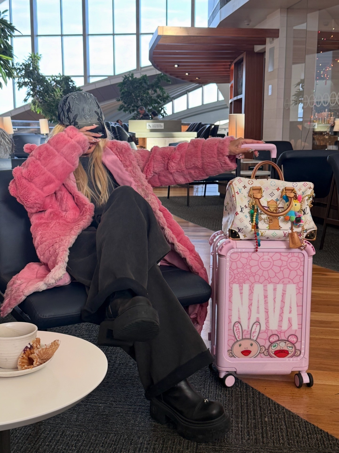 la ✈️ seoul. & yes all i watched on the plane were bts specials💜 OUTFIT DETAILS - Hat: NoManual (similar item linked), Coat: Wilson Leather, Sweat Set: Entire Studios (similar items linked), Boots: SMFK (similar item linked), Bag: Louis Vuitton 

 #LTKootd #LTKPetite #LTKTravel