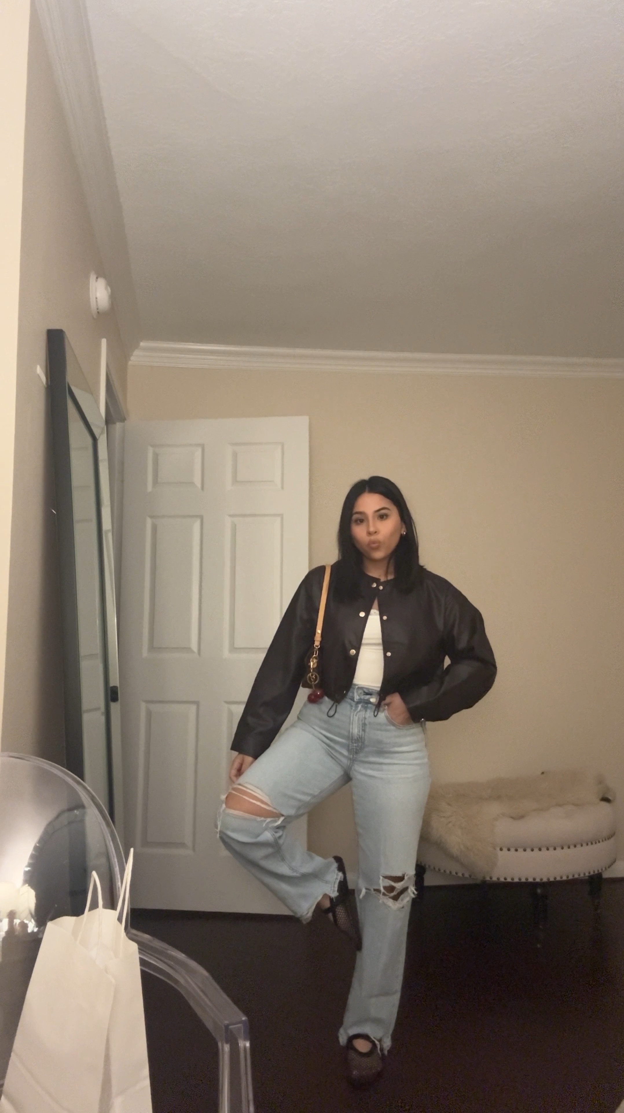 Casual outfit idea 
American eagle jeans: 2 short
White lace trim bodysuit: small 
Faux leather collarless jacket: small 
Mesh ballet flats: 6.5 
Louis Vuitton ivy wallet on chain 
Cherry bag charm 
Dainty heart initial necklace 

#LTKPetite #LTKSpringSale #LTKFindsUnder100