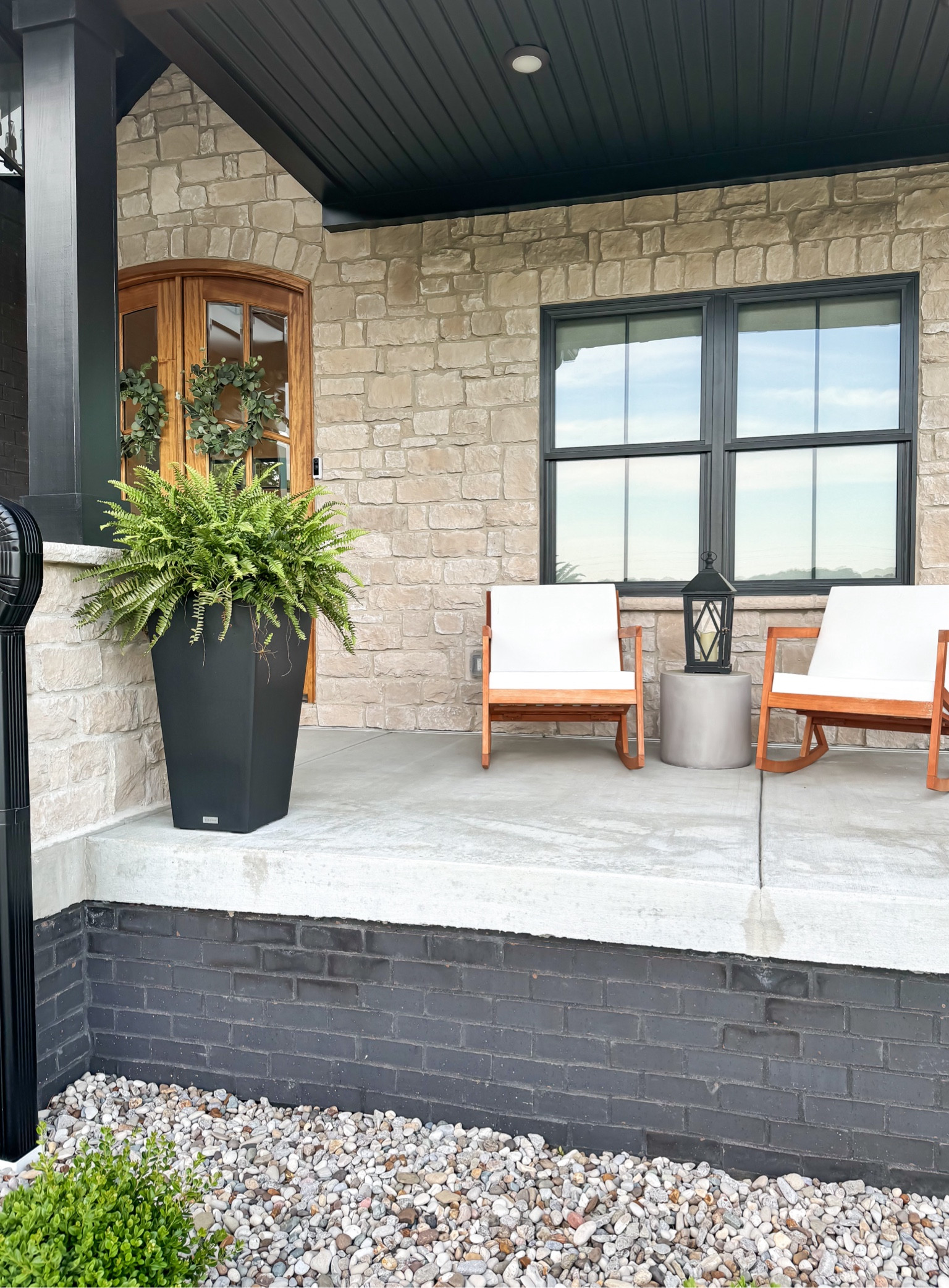 Front Porch 

Tall Planters | Front Porch Chairs | Porch Decor | Ferns | Black Planters | Natural Wood Chair | Concrete Table | Black Brick | Summer Porch Decor 

#LTKHome #LTKSeasonal
