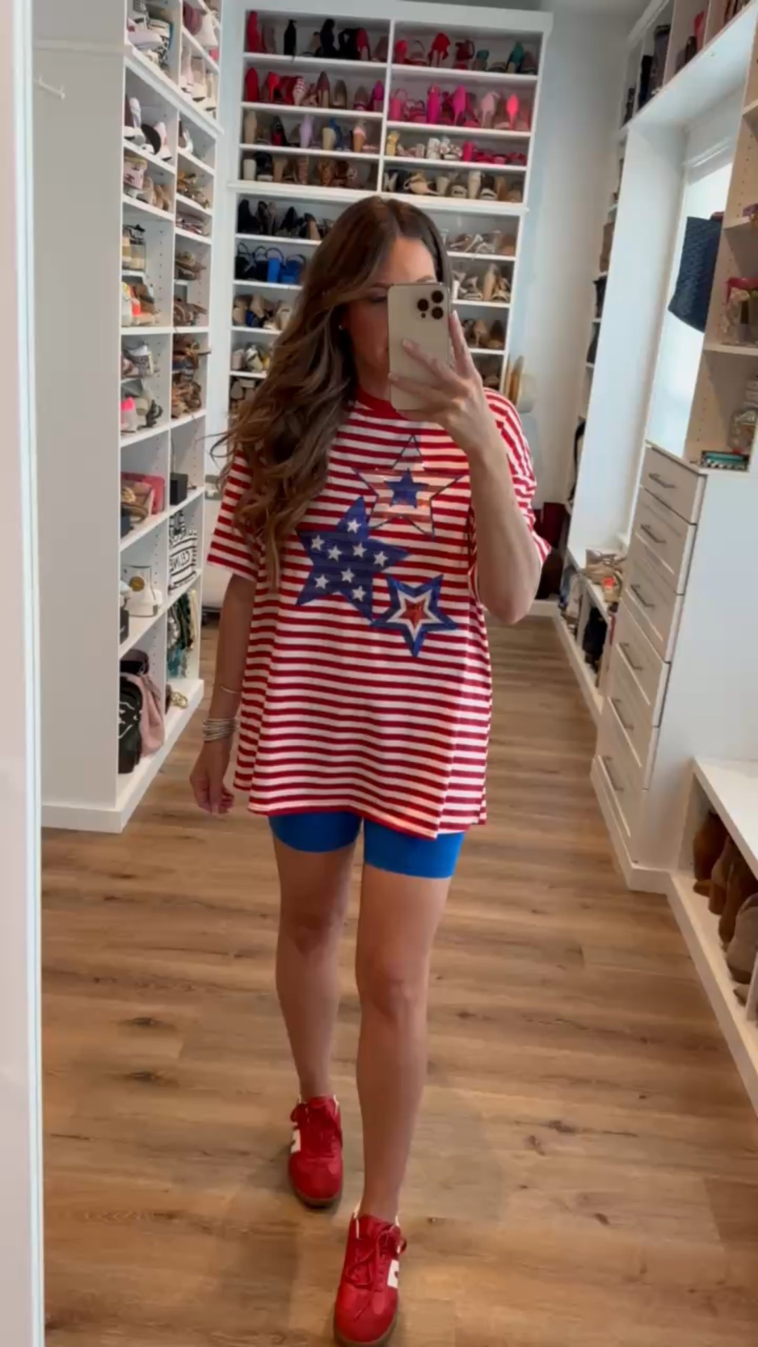 In a large sequin star stripe tee, small biker shorts, sneakers and accessories for patriotic look - fits tts

#LTKStyleTip #LTKFindsUnder50 #LTKSeasonal
