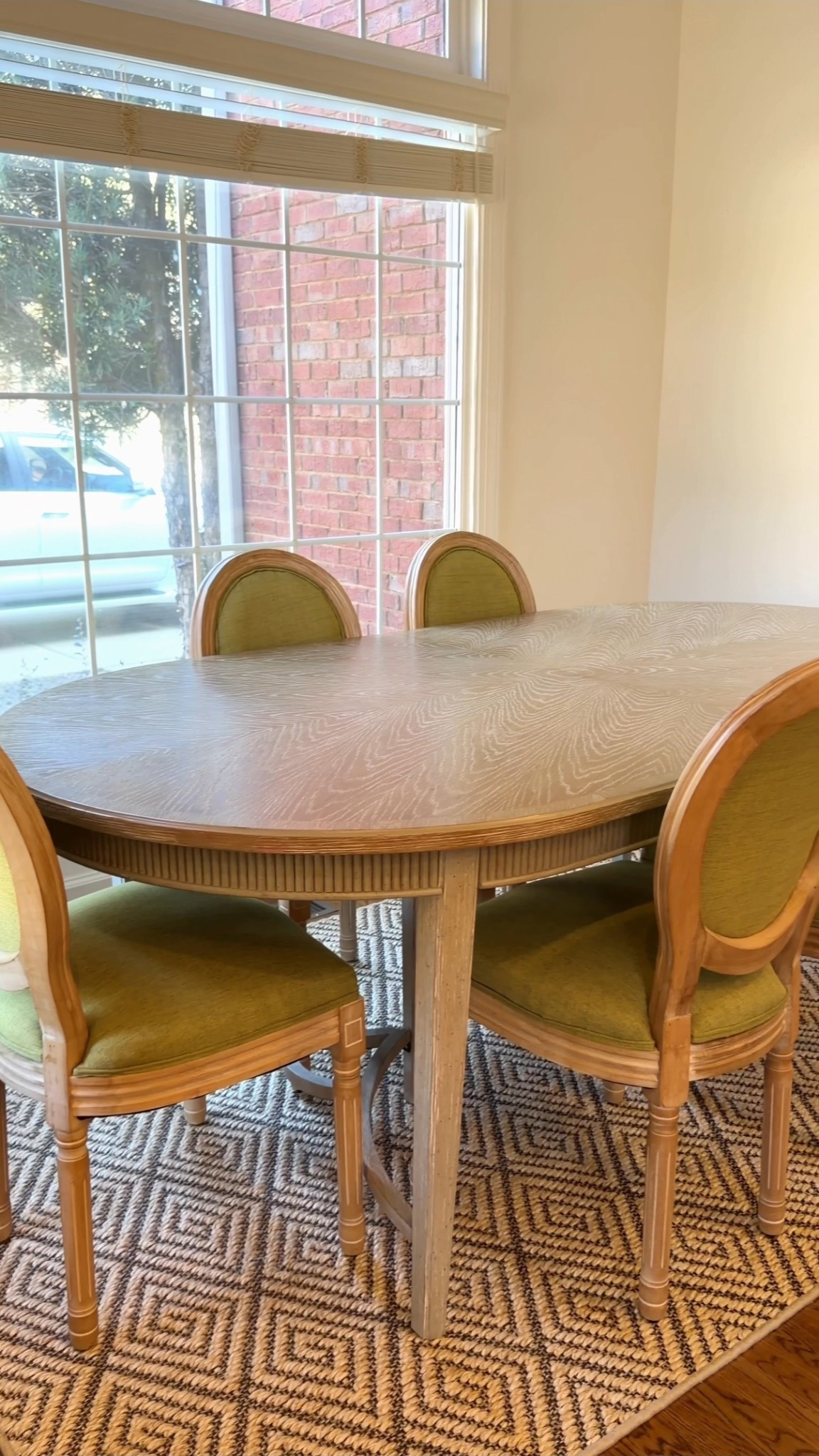 Dining chairs, diamond sisal rug, and oval dining table linked 

#LTKHome
