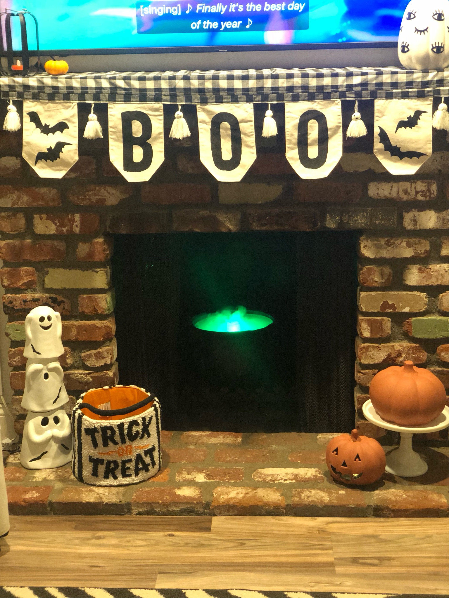 Halloween Decorations- don’t mind Ariel on the tv (lol) 

We painted these old pumpkins with a terracotta treatment and loved how they turned out 

As for the cauldron, try finding it for pick up near you if it’s not available for shipping. 

#LTKhome #LTKSeasonal