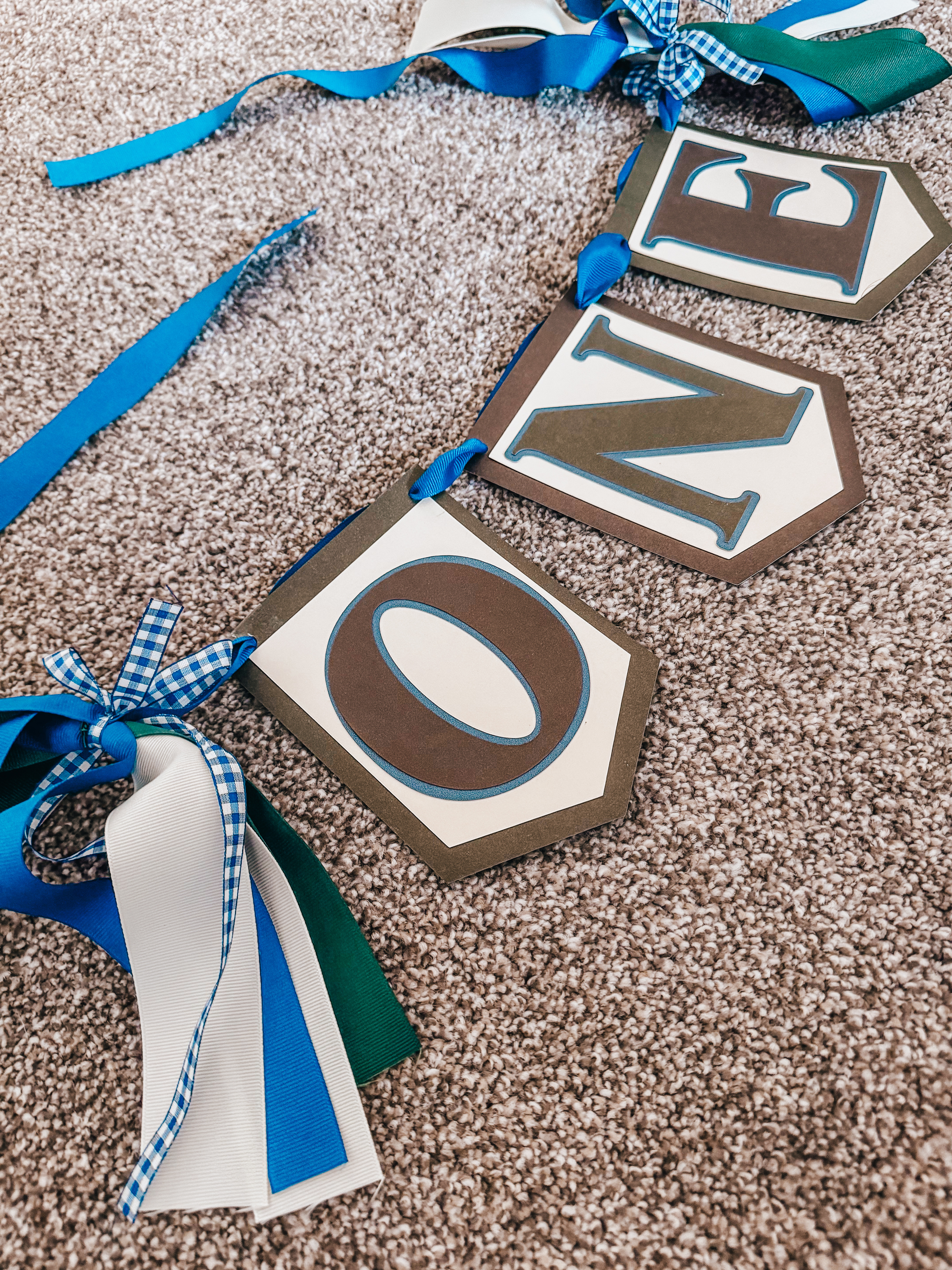 I created this birthday banner so easily—once you get comfortable navigating shapes and layering in Cricut Design Space, projects like this are truly a breeze. ✨

Materials used: Paper Studio cardstock, ribbon (green, blue, cream, and gingham), floral wire, and roll-on glue dots. Simple supplies, minimal time, and such a cute payoff.

This high-chair banner is going to photograph so well for Christopher’s cake smash. 🐻🎂 

 

#LTKKids #LTKmomlife