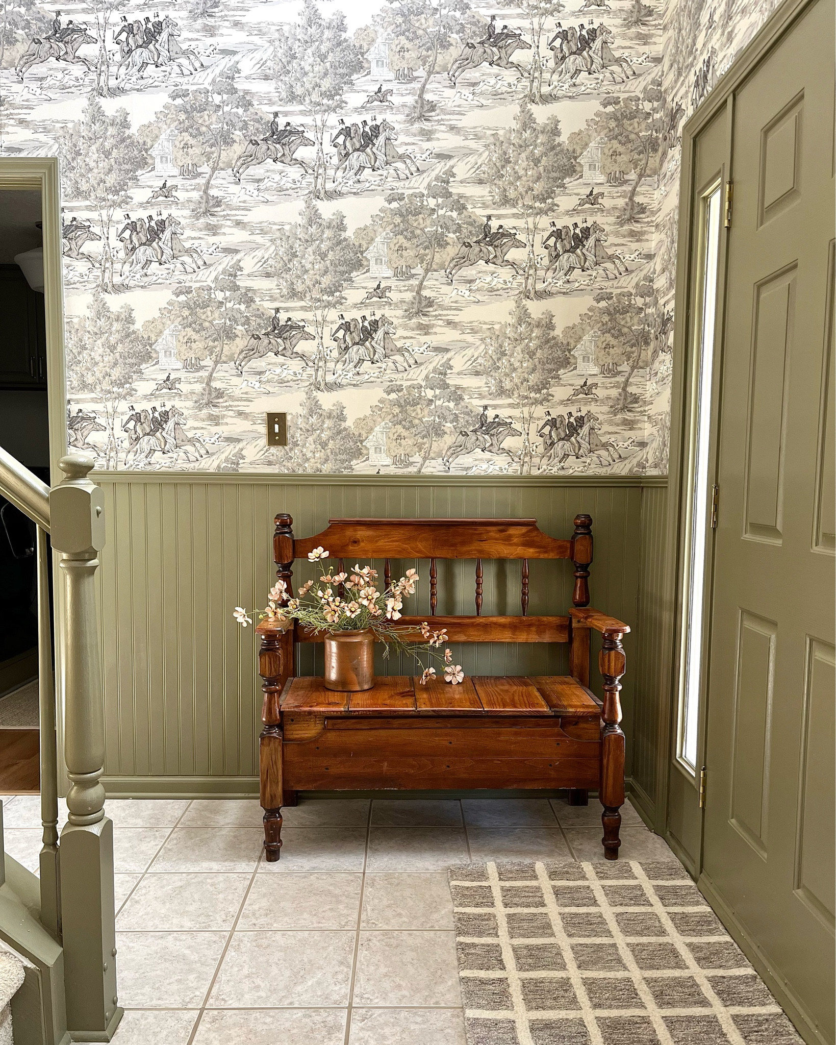 Toile equestrian wallpaper in foyer with olive green trim. Cottage core aesthetic 

#LTKunder100 #LTKstyletip #LTKhome