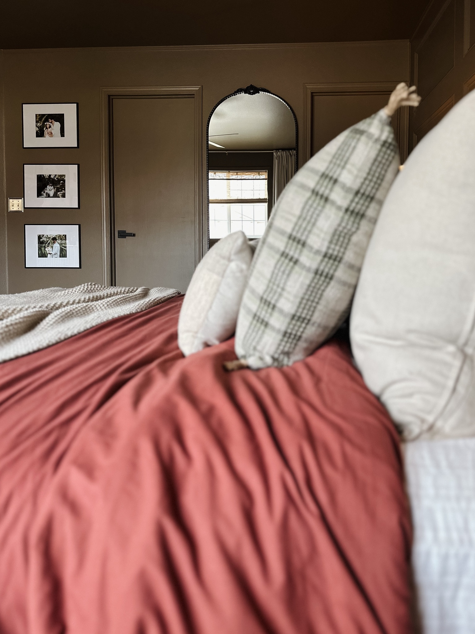 Kirkland black mirror, black wall frames, gallery wall, rust duvet, burgundy duvet, brown bedroom, layered bedding, casaluna throw, brass light switch cover, throw pillows, plaid pillows, studio McGee, target home decor, Amazon home decor 

#LTKhome #LTKstyletip