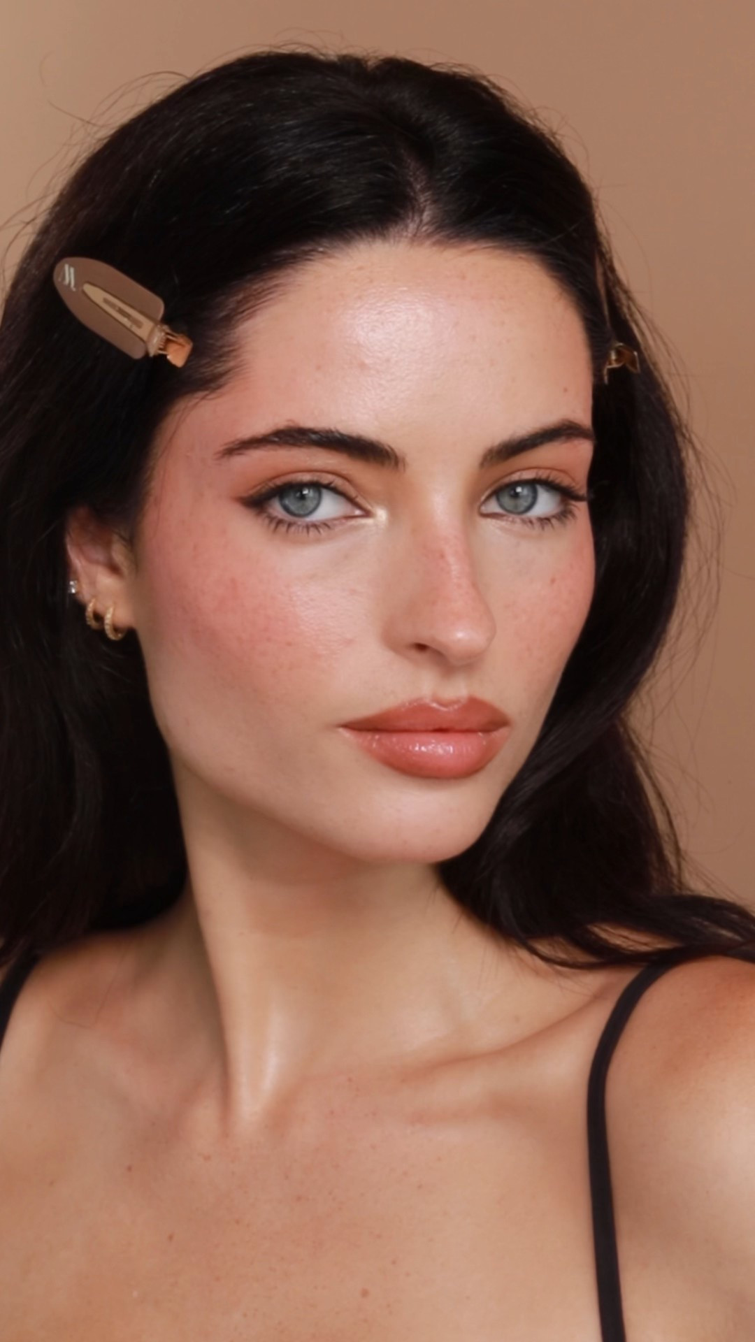 Hey my love, please see below for the lip and cheek spa breakdown.

Step one: Contour the outline of your lips with Laguna Cream Bronzer in Shade 2 (Original).
Step two: Line lips with Makeup Forever Artist Colour Pencil in 604 Up & Down.
Step three: Overline the centre of the bottom lip and the Cupid’s bow of the top lip with Makeup Forever Artist Colour Pencil in 506 Endless Cocoa.
Step four: Blend the liner, focusing on the centre of the lips, using the TANIELLE JAI No. 9 Rescue Smudger.
Step five: Brighten and lift the corners of the mouth with your concealer — I love Armani Luminous Silk Concealer as it’s super thin and brightening.
Step six: Add Makeup Forever Super Boost Lip Gloss in Shade 10 Juicy Peach Cherry.
Step seven: Mix Nude by Nature Dewy Serum Blush Drops in Peach Crush and Warm Rose, then blend with a large synthetic brush.

Let me know if you have any questions.
x MM
