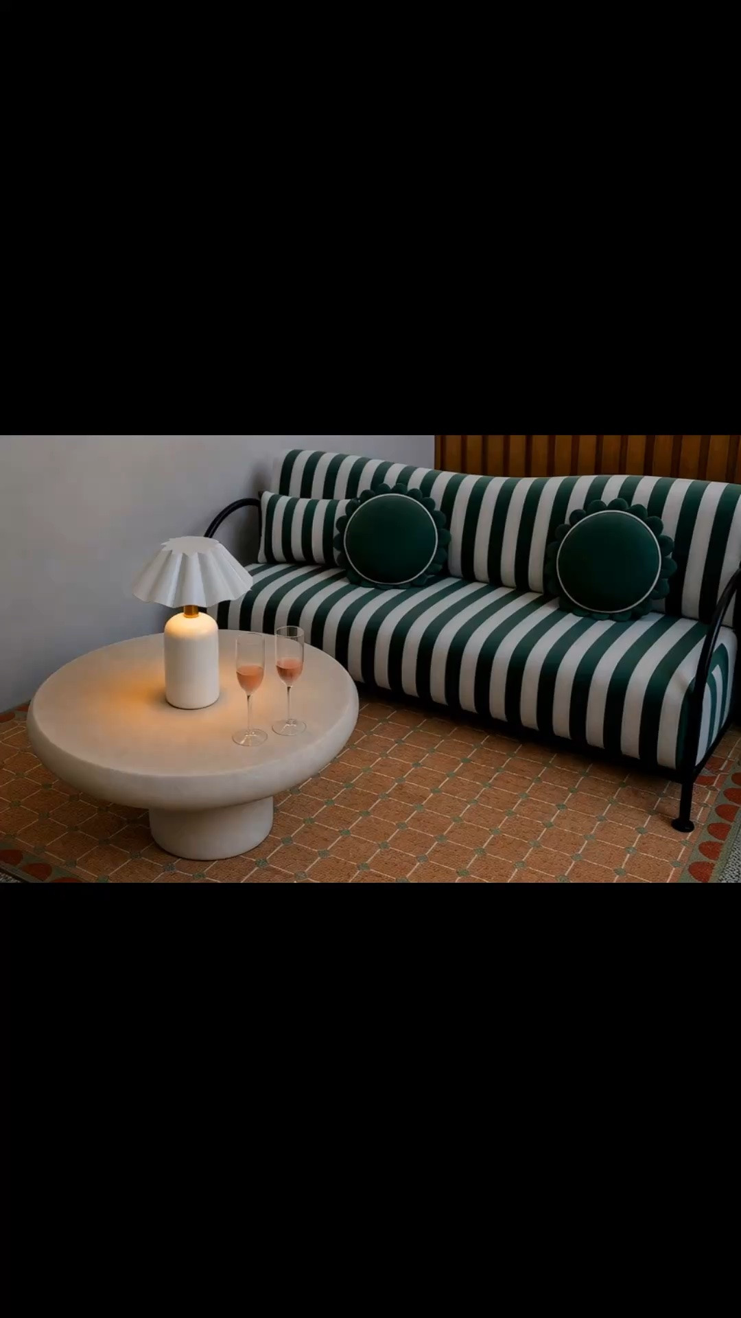 An after-dinner cocktail moment, enjoyed outdoors. ✨🥂

I love how the bold striped upholstery gives this outdoor sofa such a chic personality, while its graceful frame keeps the look modern classic and timeless. The rechargeable table lamp adds a soft, intimate glow without the need for an outlet, making it perfect for cocktails that linger after sunset.

A low round coffee table and patterned outdoor rug complete the space, creating an outdoor lounge that feels polished, comfortable, and beautifully inviting.

Shop the outdoor sofa, rechargeable table lamp, coffee table, outdoor rug, pillows, and cocktail glasses.

#LTKHome #OutdoorLiving #AfterDinnerCocktails #CocktailMoment #OutdoorSofa #StripedSofa #ModernClassic #RechargeableTableLamp #CordlessLamp #OutdoorLighting #OutdoorRug #OutdoorCoffeeTable #PatioDecor #OutdoorLounge #PatioInspiration #AlFrescoLiving

#LTKdayinmylife #LTKHome #LTKSaleAlert