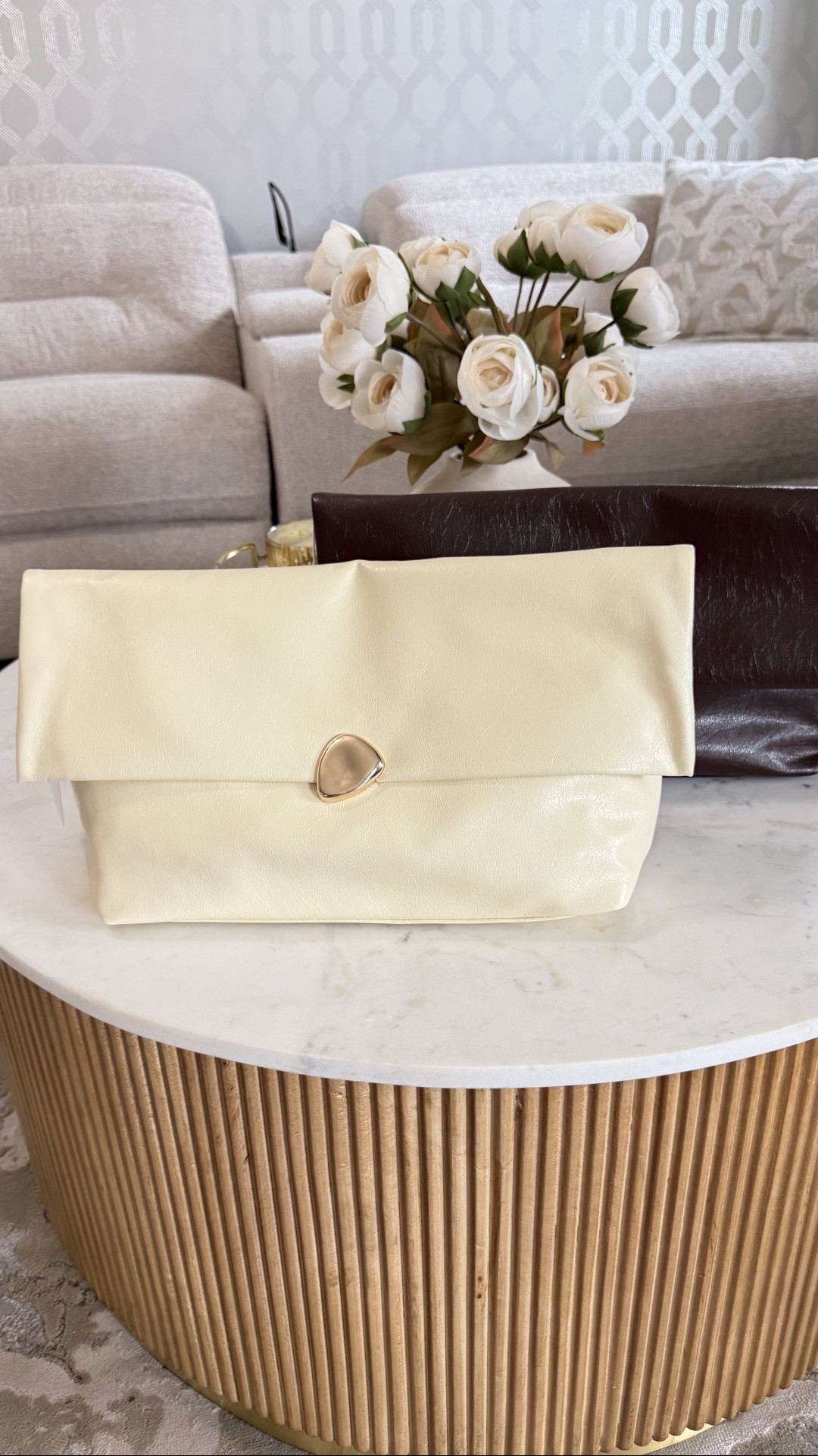 Summer clutches from @ASOS I decided I’m keeping the chocolate brown. The cream is good, but felt more like a butter yellow color if you need that.