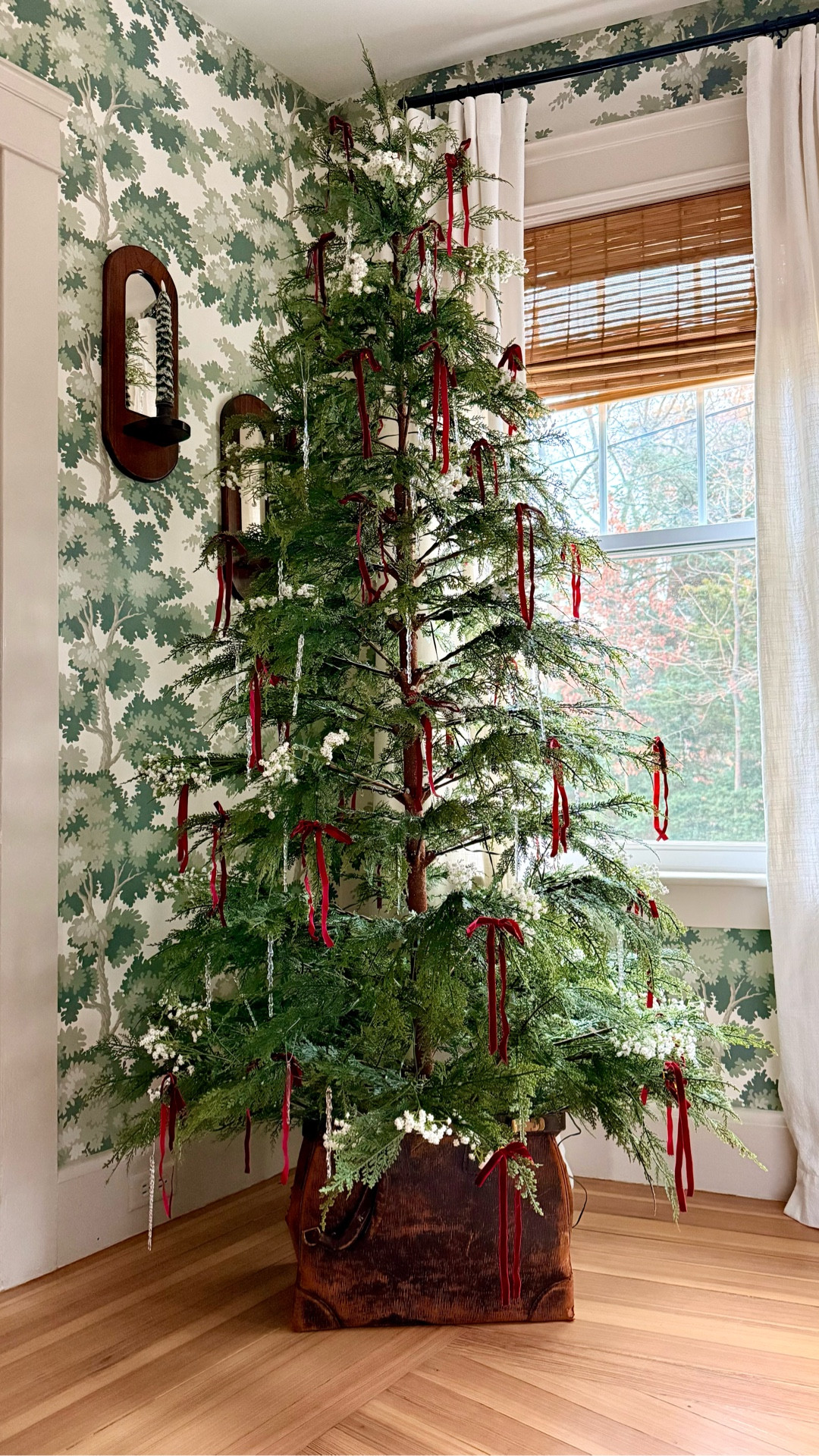 Baby’s breath for texture, icicles for sparkle, bows for tradition… and a vintage doctor’s bag as the perfect tree collar. 

#christmasdecor #christmastree

#LTKSeasonal #LTKHoliday #LTKHome