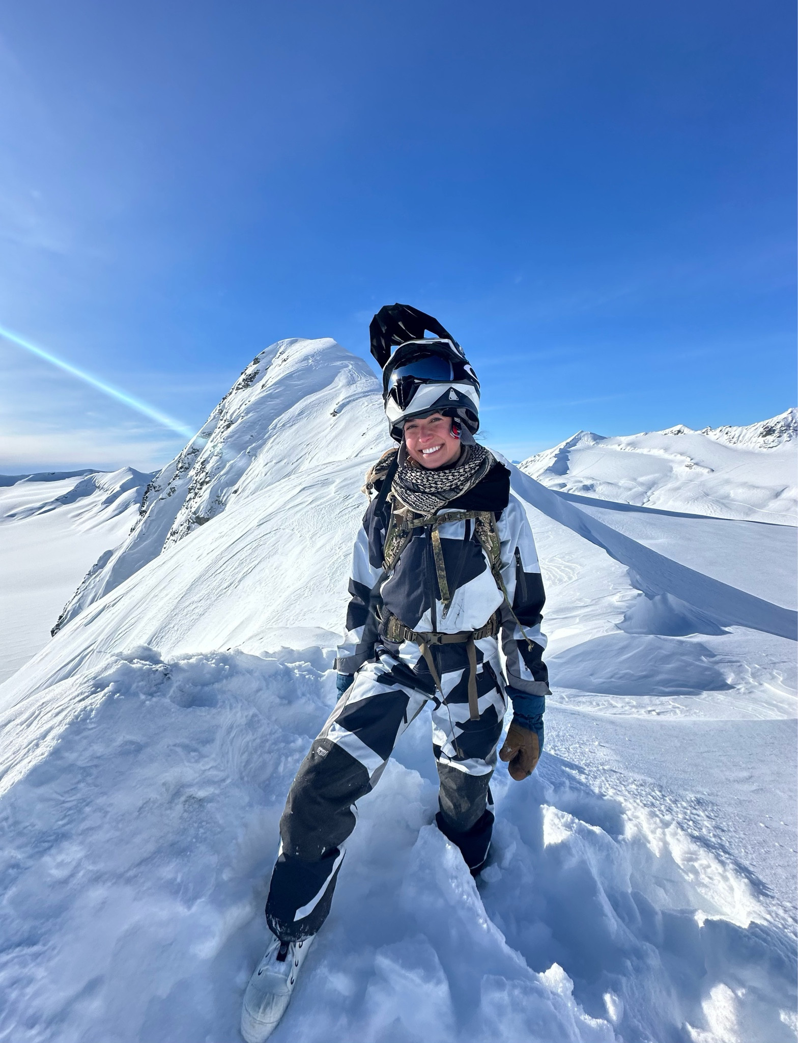 Snow machine suit - Tobe 
Helmet- Tobe 
Boots - Alaska Gear Company 
Bag - Sitka 

