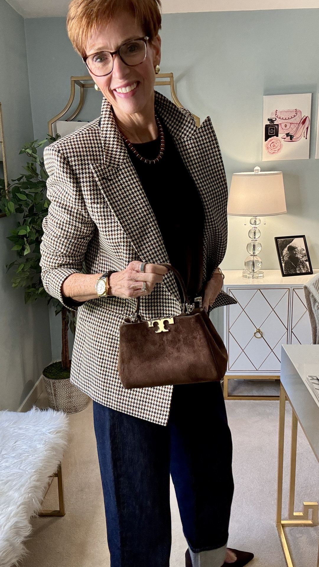 I’m 56, 6'1", and I’ve become VERY selective about what gets my splurge money.
Because I don't think looking polished means everything you're wearing needs to be expensive.

Want the links sent to you? Comment SPLURGE and I’ll DM them!

For this fall outfit, I started with a brown cashmere crewneck and dark-wash jeans—two simple wardrobe staples. Then I added the pieces I will spend more on: a beautifully tailored houndstooth blazer, a brown suede handbag and brown suede pointed-toe block heels.
And that is increasingly my formula for getting dressed: let a few exceptional pieces elevate everything else.

The houndstooth blazer gives the jeans structure. The chocolate-brown suede accessories pull the whole color palette together. And the pointed toe adds just enough polish without making the outfit feel overly dressed.

For me, a splurge-worthy piece has to earn its place in my closet. I want quality, versatility and enough staying power that I'll still be excited to wear it years from now—not something I'll love for one season and forget about the next.

Now I'm curious: where are YOU most willing to splurge—blazer, bag or shoes?
Save this for classic fall outfit inspiration, share it with a friend who loves timeless style, and follow for more real-life outfit ideas for women over 50—including plenty of tall-friendly style from someone who's 6'1".