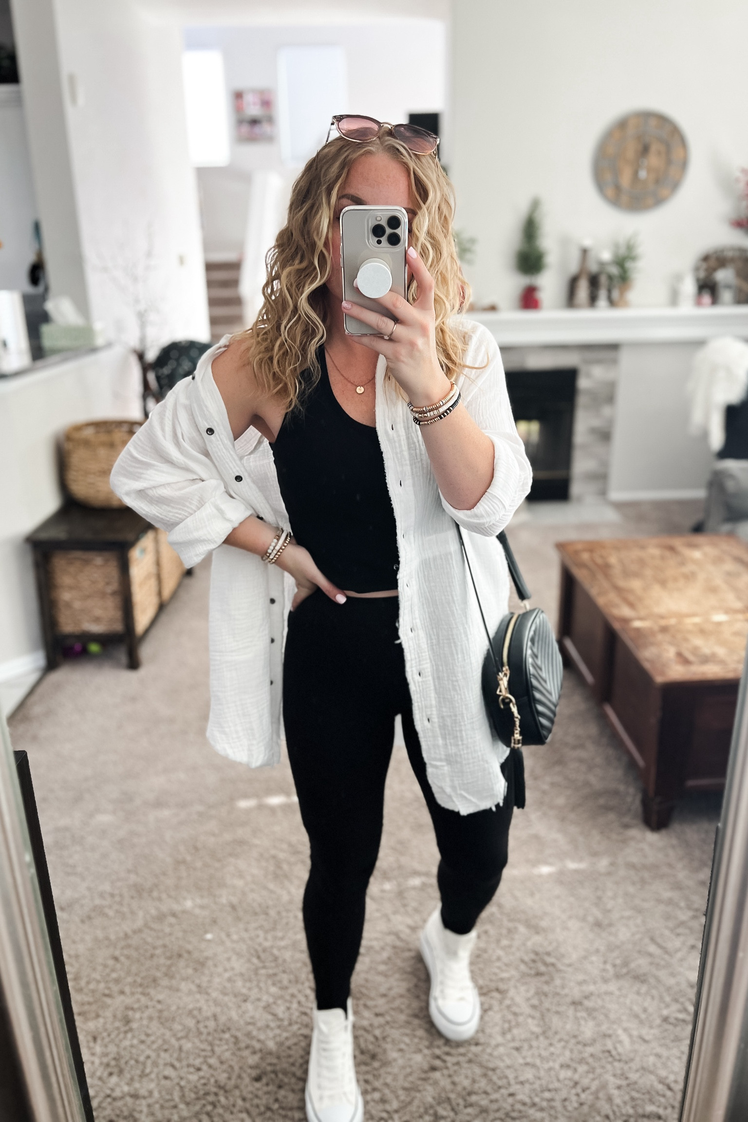 Casual outfit with a flowy button down shirt, crop tank top, leggings, and high top platform sneakers. The button down fits oversized! 
//Amazon outfit ideas, casual outfit ideas, casual fashion, amazon fashion, found it on amazon, amazon casual outfit, cute casual outfit, outfit inspo, outfits amazon, outfit ideas, Womens shoes, amazon shoes, Amazon bag, purse, size 4-6, early spring outfits, winter to spring transition outfit, travel outfit, vacation outfit, #ltkitbag #ltkfindsunder100 #ltkshoecrush #ltksalealert 

#LTKstyletip #LTKtravel #LTKfindsunder50