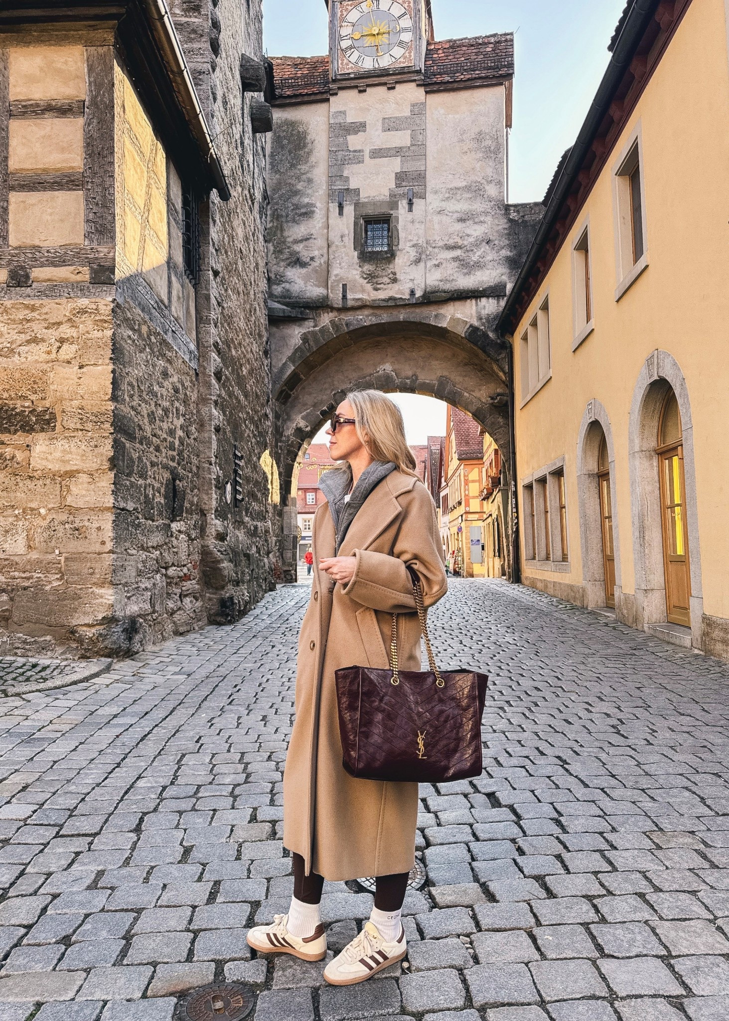 Casual chic travel look, European vacation, chocolate brown leggings, camel coat, Adidas Samba sneakers, burgundy YSL tote bag

#LTKActive #LTKSeasonal #LTKTravel