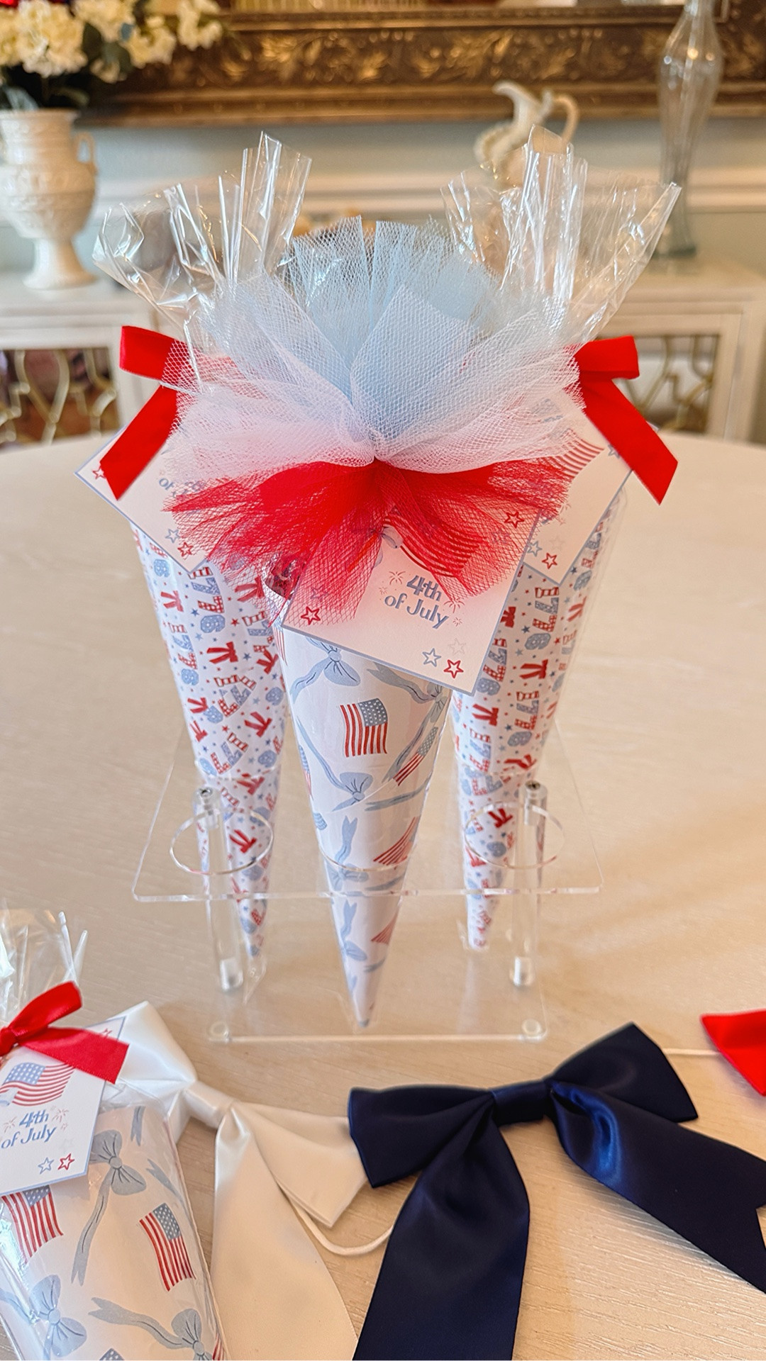Hosting for the 4th? 🇺🇸 These easy DIY party favors come together in minutes! I’m linking the paper, taffy, premade bows, my Bestie Bow Maker, and everything I used to recreate this festive idea. ❤️🤍💙✨

#LTKParty #LTKHome #LTKFinds #FourthOfJuly #EntertainInStyle