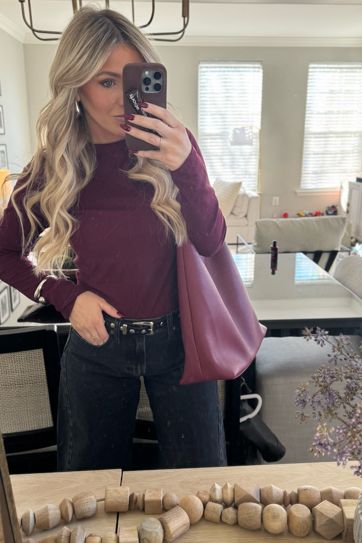 Very casual top for Valentine’s Day! This top is the prettiest color and I love how it pairs with this bag 😍 wearing a medium in the top. 

#LTKStyleTip #LTKSeasonal #LTKFindsUnder100