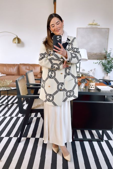 Back to work wearing this monochromatic office outfit - a Gucci reversible coat, slip skirt, and sweater.

#workwear #officeoutfits #gucci #LTKFind 

#LTKworkwear #LTKSeasonal #LTKstyletip