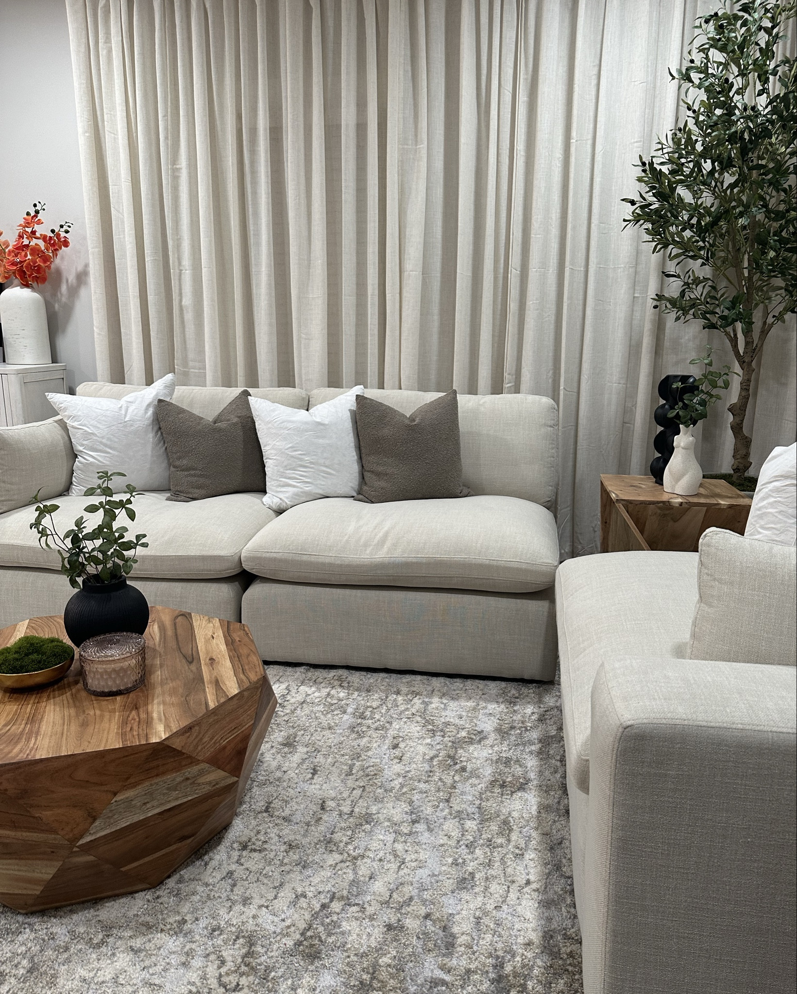 We added floor to ceiling light weight Linen like curtains to make the room look and feel bigger. 
These curtains come in a beautiful variety of colors to fit any esthetic. 

#LTKHome #LTKStyleTip #LTKSeasonal