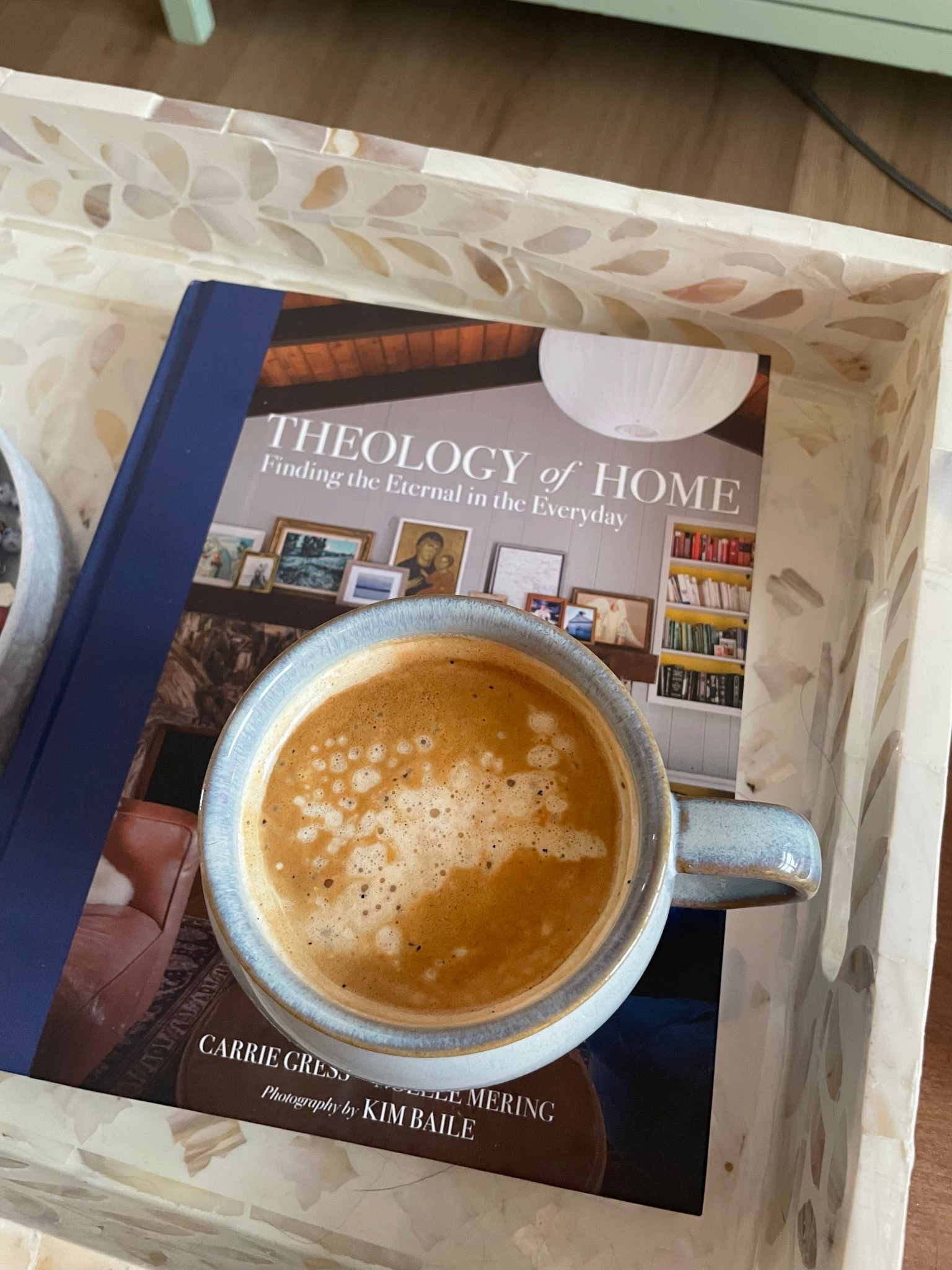 Cozy morning vanilla latte in one of my favorite mugs. I love this coffee table book so much! It was a wedding gift and truly the best addition to a home!  #coffee #coffeetablebook 

#LTKHome #LTKGiftGuide #LTKHoliday