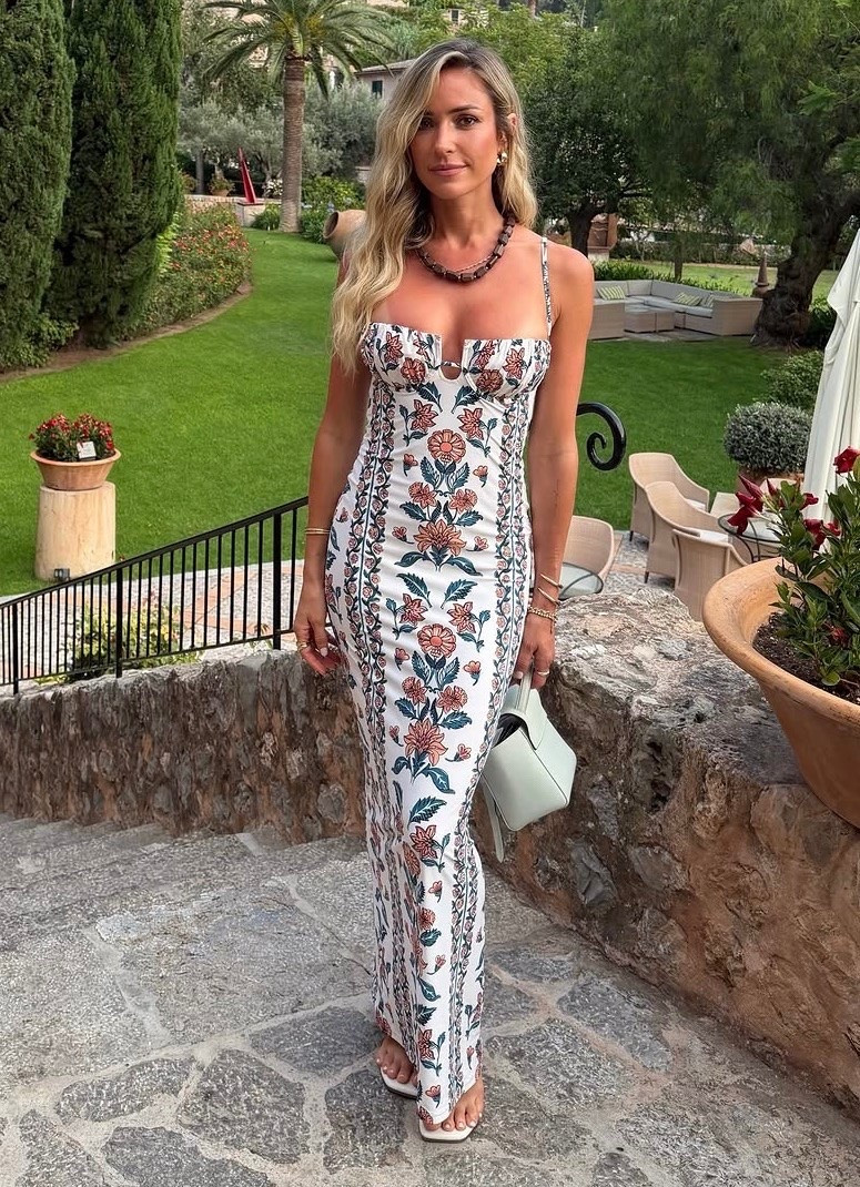 Kristin Cavalleri's gorgeous option for a daytime occasion, this pretty maxi boasts a colorful floral print, key-hole cutouts, and an open back. You’ll be confidently supported thanks to a built-in underwire and demi cups, while adjustable tie straps allow you to achieve the perfect fit.