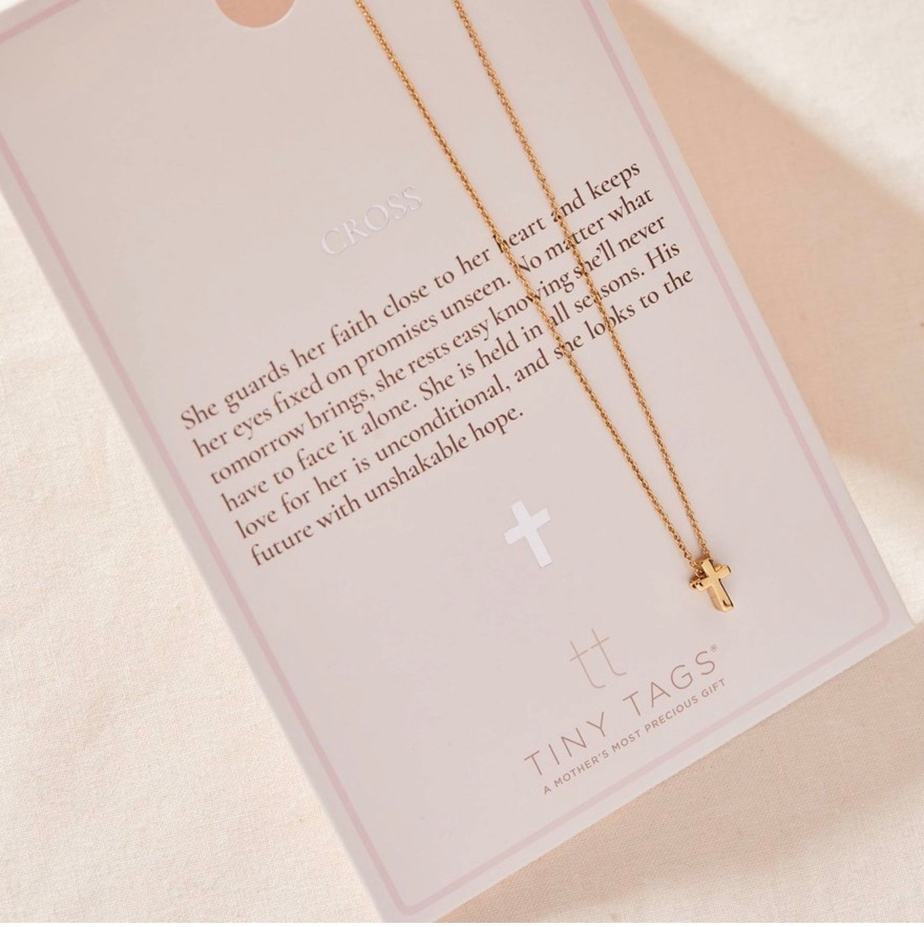 Tiny tags cross necklace