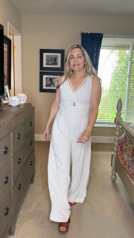 A white jumpsuit is the perfect piece to add to your capsule wardrobe for spring & summer. It’s also part linen which is even better!  The cut outs & cute straps & summer fun detail, but it doesn’t show you much skin. While white just screams summer, it comes in 18 other colors in sizes S-XL. I’m wearing small which fits perfectly. At 5’ the length is great for heels. 
.
.
Chic style, summer & spring looks, backyard entertaining, poolside looks, resort wear, bridal shower, baby shower, white outfits, classic style, 2024 spring fashion, spring capsule wardrobe, 2024 clothing trends for women, grown women outfits, spring 2024 fashion, spring outfits 2024 trends, spring outfits 2024 trends women over 40, spring outfits 2024 trends women over 50, white pants, brunch outfit, summer outfits, summer outfit inspo





#LTKunder100 #LTKSeasonal #LTKtravel #LTKOver40 #LTKGiftGuide #LTKstyletip #LTKVideo #LTKunder50 #LTKbeauty