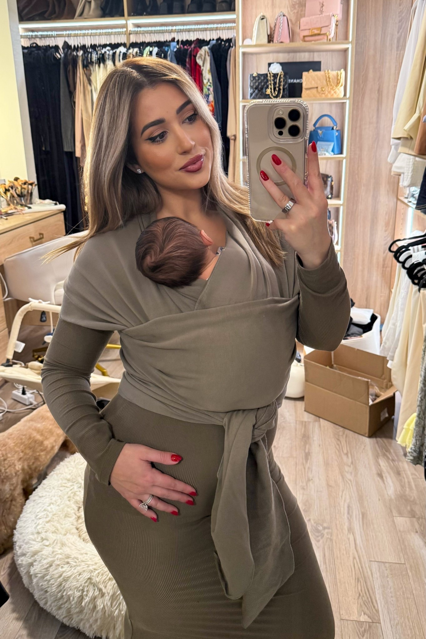 Baby wearing during the newborn stage is the only way I can get anything done 🫶🏼 wearing a size medium in the dress. 

#LTKFindsUnder100 #LTKBaby #LTKPetite