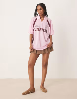 ASOS DESIGN oversized football shirt with valencia graphic in pink | ASOS (Global)
