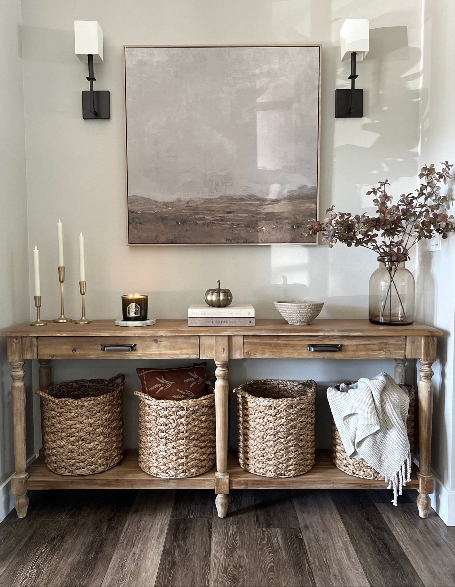 Fall in the foyer. This console table never fails! 

Fall stems / glass vase / pumpkin decor / organic / baskets / foyer / candle sticks / fall pillows / bowl / artwork / Target finds / studio McGee / hearth and hand / magnolia / modern organic / fall decor 

#LTKSeasonal #LTKHome #LTKFindsUnder100