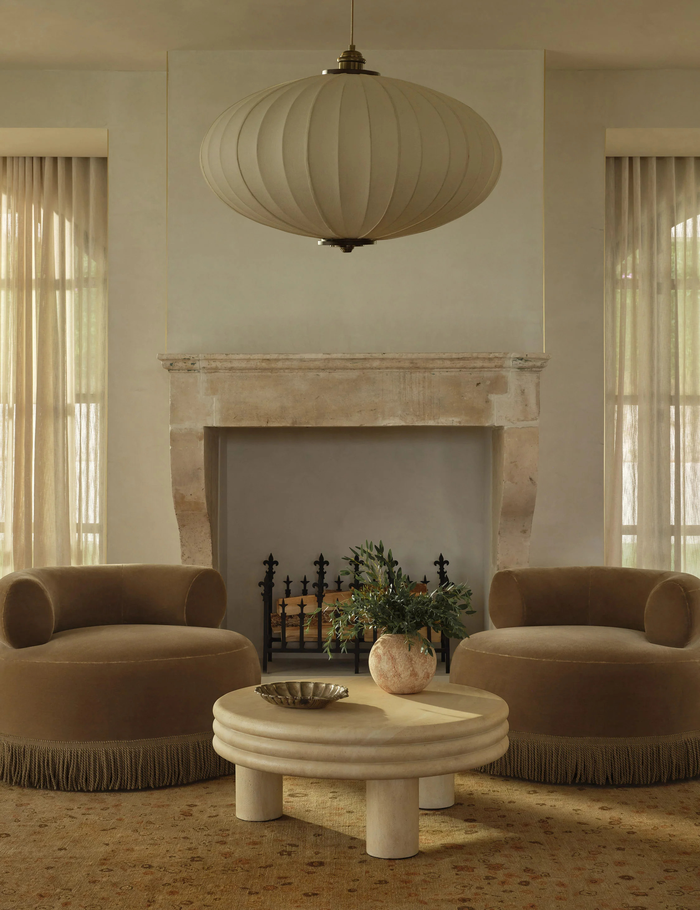 Brittny Round Coffee Table by Button Atelier x Co.House Designs, Cream Faux Travertine | Lulu and Georgia 