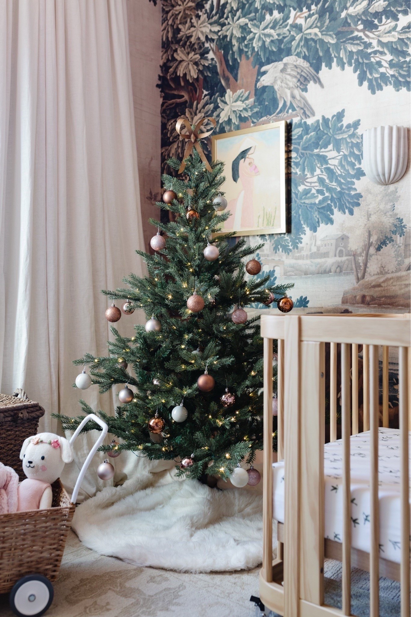 5’ Christmas tree that is so easy to set up, has multiple light settings and looks perfect with the brass bow tree topper! Love the nursery Christmas decorations 

#LTKHoliday #LTKHome #LTKSeasonal