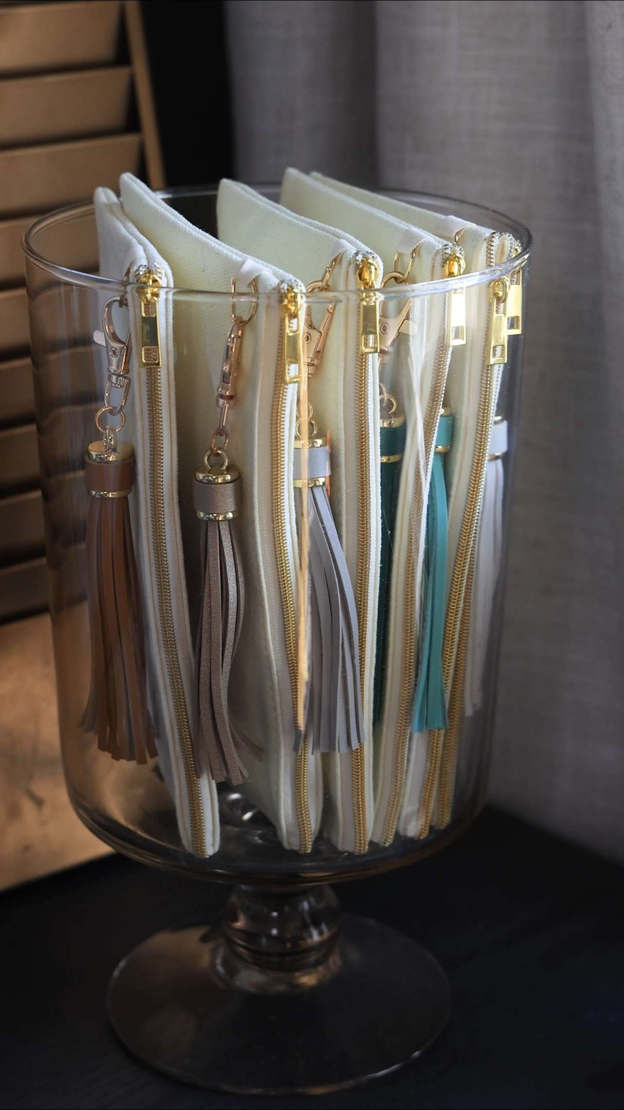 Stylish ways to organize small office supplies | Small fabric bags with tassel key rings to store small items #homeoffice 

 #LTKHome
