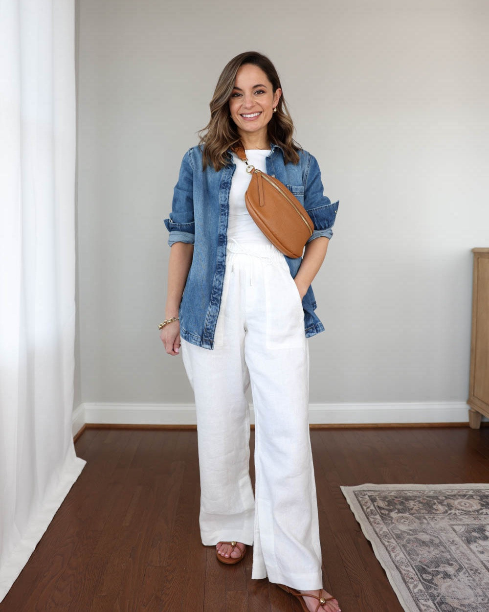 My favorite white tank top from Quince is back in stock! Here are a few ways to style it.

Tank Top (Quince): xs

Outfit 1:
Shirt jacket (Walmart): xs 
White pants (Athleta): petite xxs
Sandals (DV)
Bag (Quince)

Outfit 2:
Yellow skirt (Quince): xs
Straw bag (Sezane)
Ballet flats: tts

Outfit 3:
Striped Sawyer Pants (LOFT): petite xxs Runs large 10.5” rise 28” inseam
Heels: tts

My measurements for reference: I’m 4’10” and 105lbs. My bust, waist, and hip measurement is 32”, 24”, and 36”.

#LTKSeasonal #LTKPetite #LTKootd