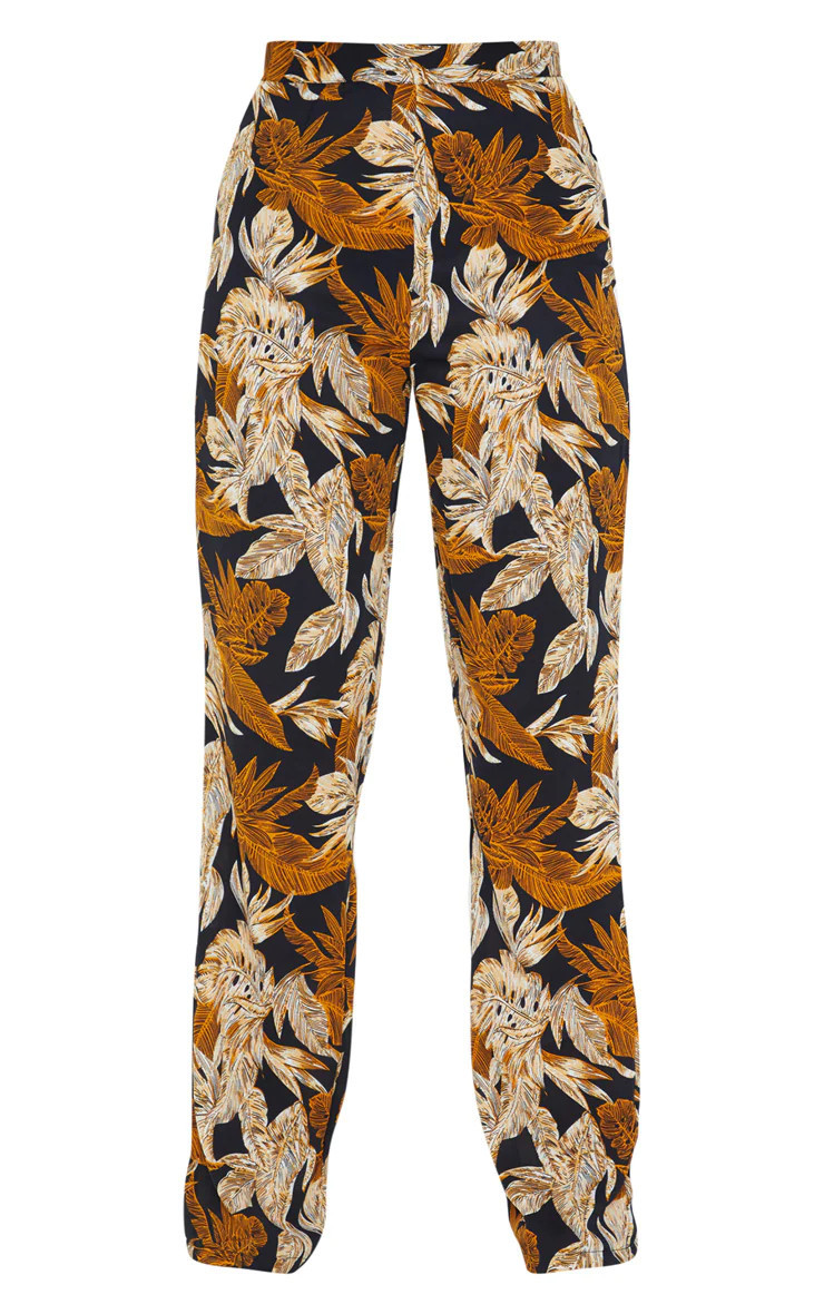 Black Palm Leaf Print Beach Flares | PrettyLittleThing US