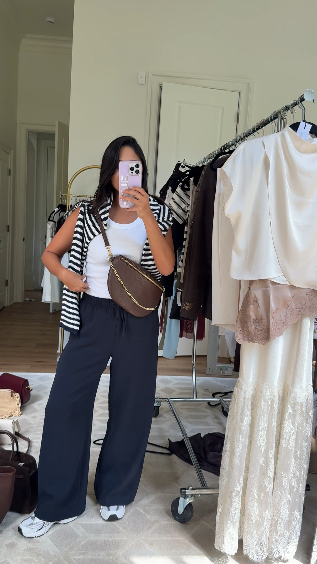 The @Aritzia  lodge pants are the absolute best travel pants bc they’re wrinkle resistant plus they come in 3 different lengths and multiple colors. 
Be sure to take 20% OFF my @Gigi New York Beck Sling Bag with code: HAUTE20

#LTKCon #LTKootd #LTKTravel