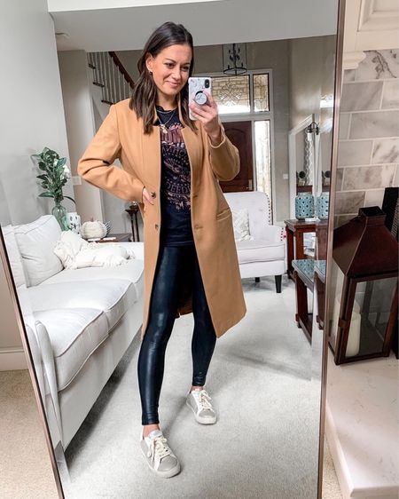 Spams faux leather leggings outfit - leggings run small, old navy coat (runs true to size for an oversized fit, graphic tee, sneakers 

#LTKunder50 #LTKstyletip #LTKSeasonal