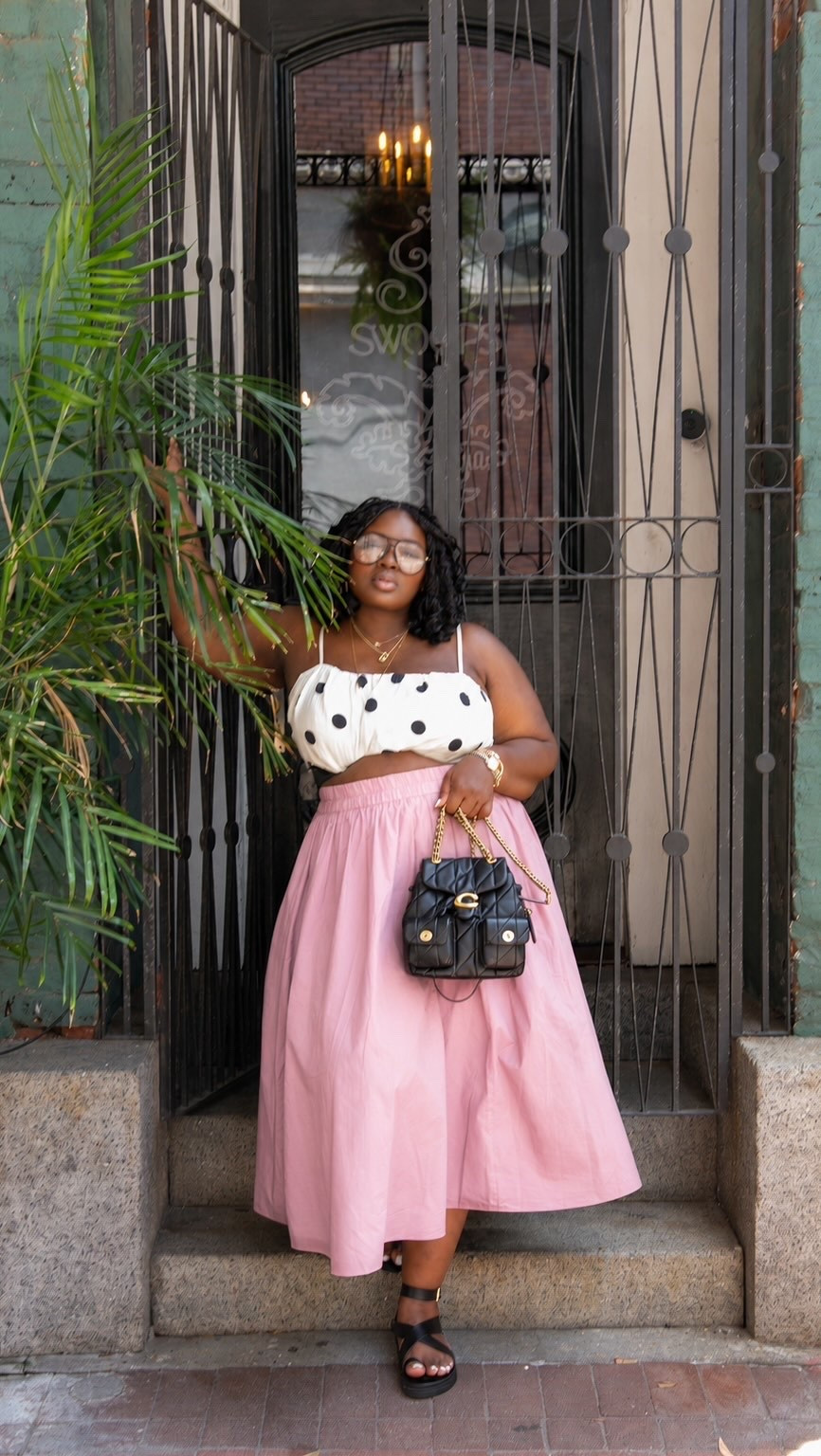 A playful polka dot top paired with a flowy pink skirt creates a timeless outfit that feels feminine, comfortable, and perfect for sunny days.   pink skirt outfit ideas, polka dot outfit, feminine summer outfits, midi skirt outfit, brunch outfit ideas, summer fashion inspiration, vintage inspired outfit, classy casual outfits, vacation outfit ideas, cute summer outfits, feminine style inspiration

#LTKootd #LTKSeasonal #LTKMidsize