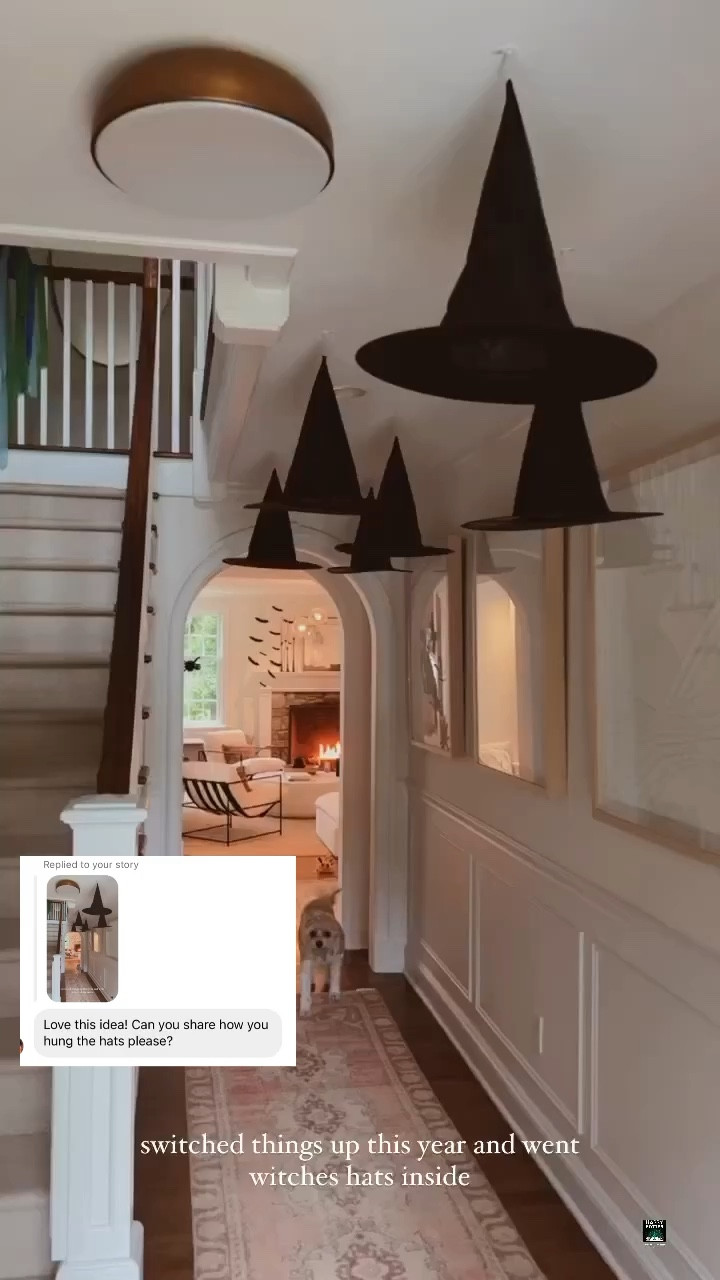 Halloween Home Decor! We usually hang the witches hats on our porch, but decided to hang in our entryway this year! To hang, I ran fishing line through tip of hat and tied the end off with with a bead to keep secure. I then tied it to tiny white command hooks on the ceiling for easy removal. I’ve never had any issues with the paint coming off & thumb tacks make holes 

#LTKhome #LTKHoliday #LTKHalloween