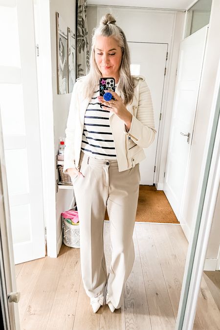 Ootd - Tuesday. Wide legged, taupe pants (Guts Gusto) paired with a striped shirt and a beige leather biker jacket. Linnen slingback heel with a bow. 



#LTKworkwear #LTKstyletip #LTKshoecrush
