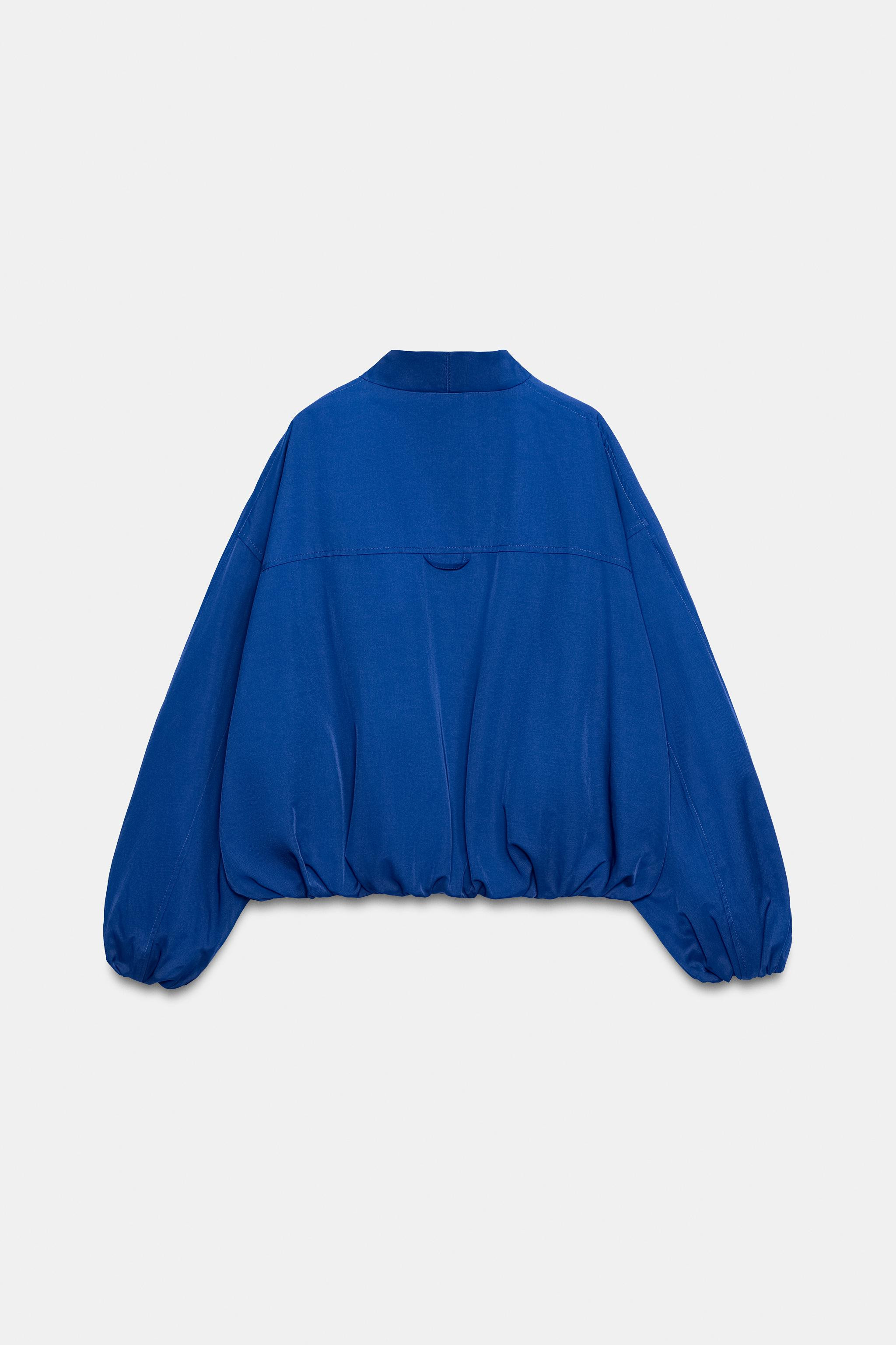 ZARA WOMAN COLLECTIONBomber jacket with a V-neck and long puffed sleeves with elastic cuffs. Fron... | Zara US