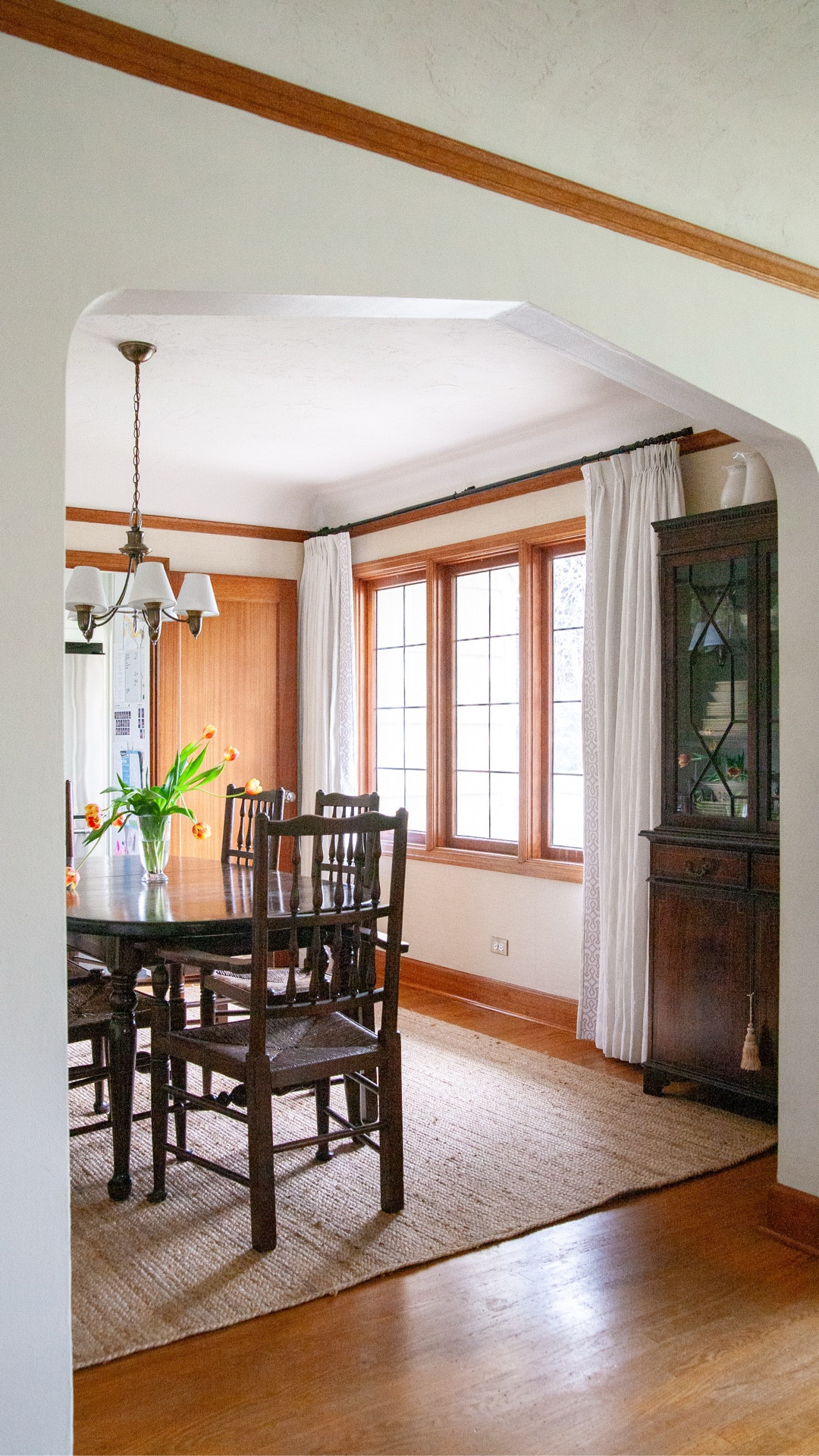 I never really considered painting it cause it’s sooo much work, and I couldn’t commit to that big of a change to an old house. But it’s not my favorite wood color and I never really loved it. But the other day I was daydreaming about decorating a new house and I felt a little sad to think of not having the original wood trim anchoring things. I even think it works well with some dark antique wood pieces, nothing is too overpowering or dusty old lady. ￼Here’s to blooming where you’re planted, I guess??

#LTKHome