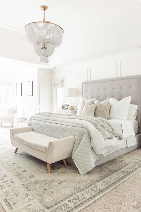 I just switched out to a gray on gray neutral bedding motif in our bedroom and I’m living the lighter look for the season! home decor bedroom decor neutral bedroom suite white bedding area rug white bead chandelier platform bed Sherpa storage bench neutral accent pillow

#LTKHome #LTKStyleTip
