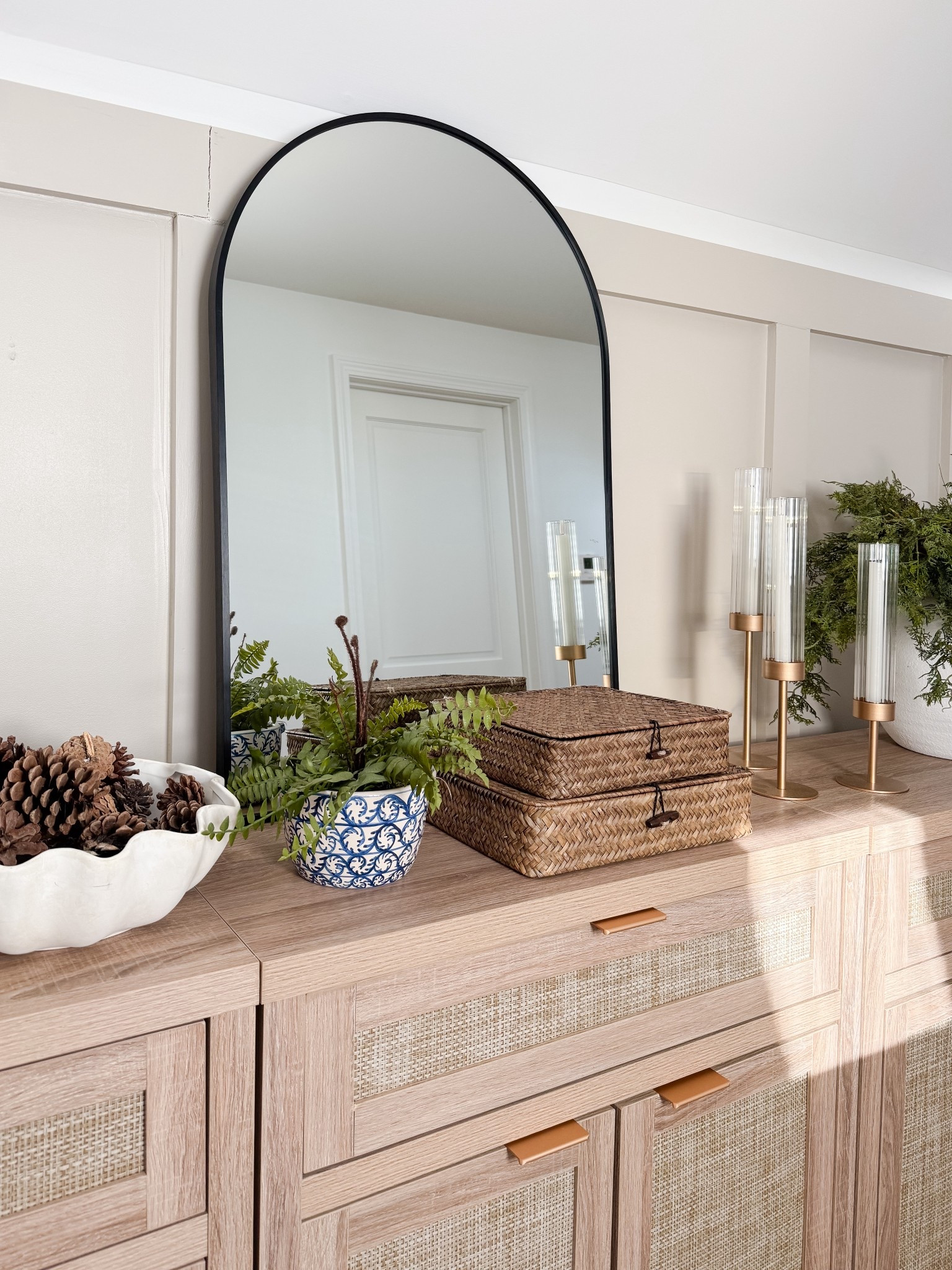 This woven sideboard adds storage and texture while elevating the entire space. coastal storage furniture, sideboard buffet, woven furniture, neutral home decor, coastal interiors, timeless furniture, home organization, living room styling, sherricalnanhome

#LTKFindsUnder50 #LTKHome