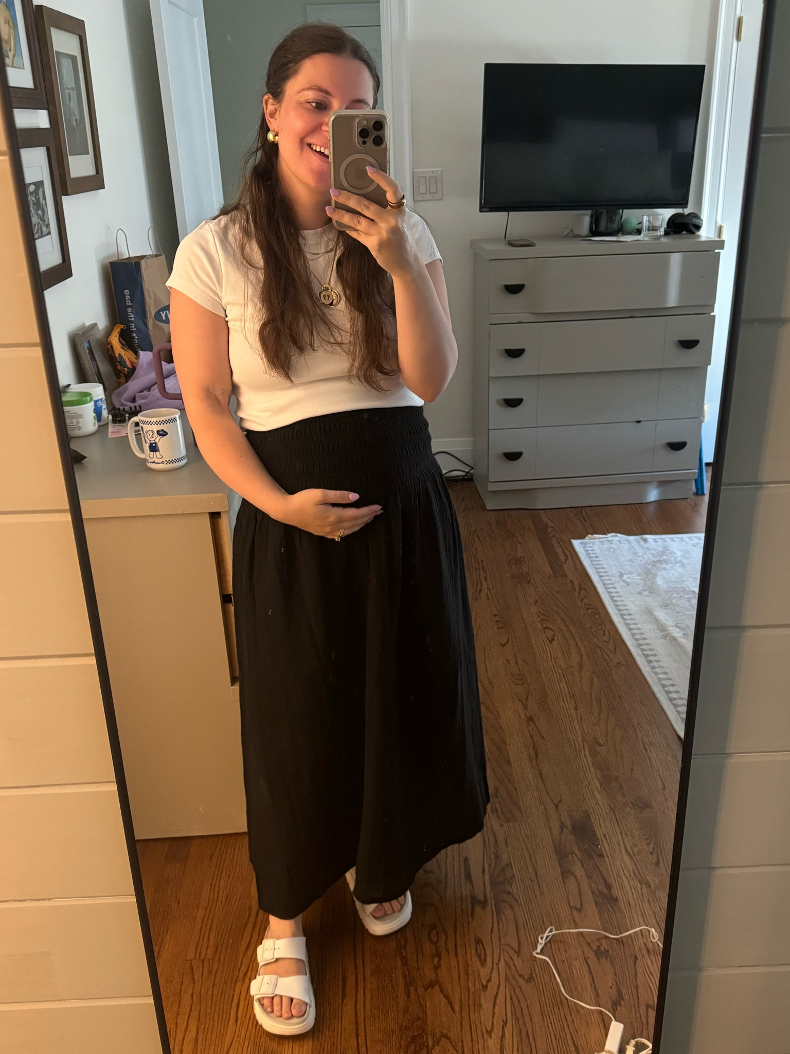 Obsessed with this gauzy skirt!! I’m 5’3” and got regular M so that it would be full length. Very bump friendly. Wearing M in top and shoes are TTS

#LTKBump