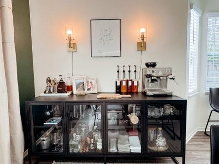 A good sideboard or buffet is everything 🙌🏼 This one doubles as a coffee and cocktail bar for our family! Plus, the espresso machine I literally cannot live without. 

Pro tip - remove the labels from your budget coffee syrups and make your own with my fave label maker 😉

#LTKsalealert #LTKhome #LTKfindsunder50