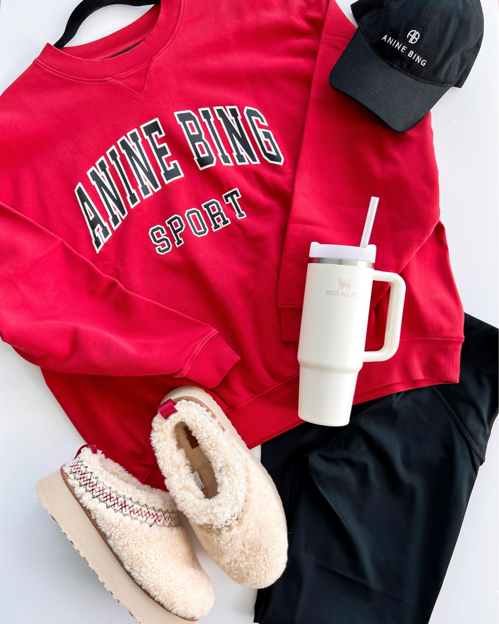 Shopbop Black Friday Sale! 25% off with code HOLIDAY. These Anine Bing sweatshirts don’t come on sale too often but they’re included in this sale. Great splurge gift for yourself or someone special! 

Holiday gift guide! This Anine Bing sweatshirt sold out really fast last year but I’m happy to see it’s back again this year! Sweatshirt shown here in size large. Spanx booty boost flare leggings size XL petite. Ugg Tazz braided slippers no longer available but linked similar. Anine Bing baseball cap. Stanley cup. All of these items would also make great gifts for the holidays! 

#LTKCyberWeek #LTKGiftGuide #LTKHoliday