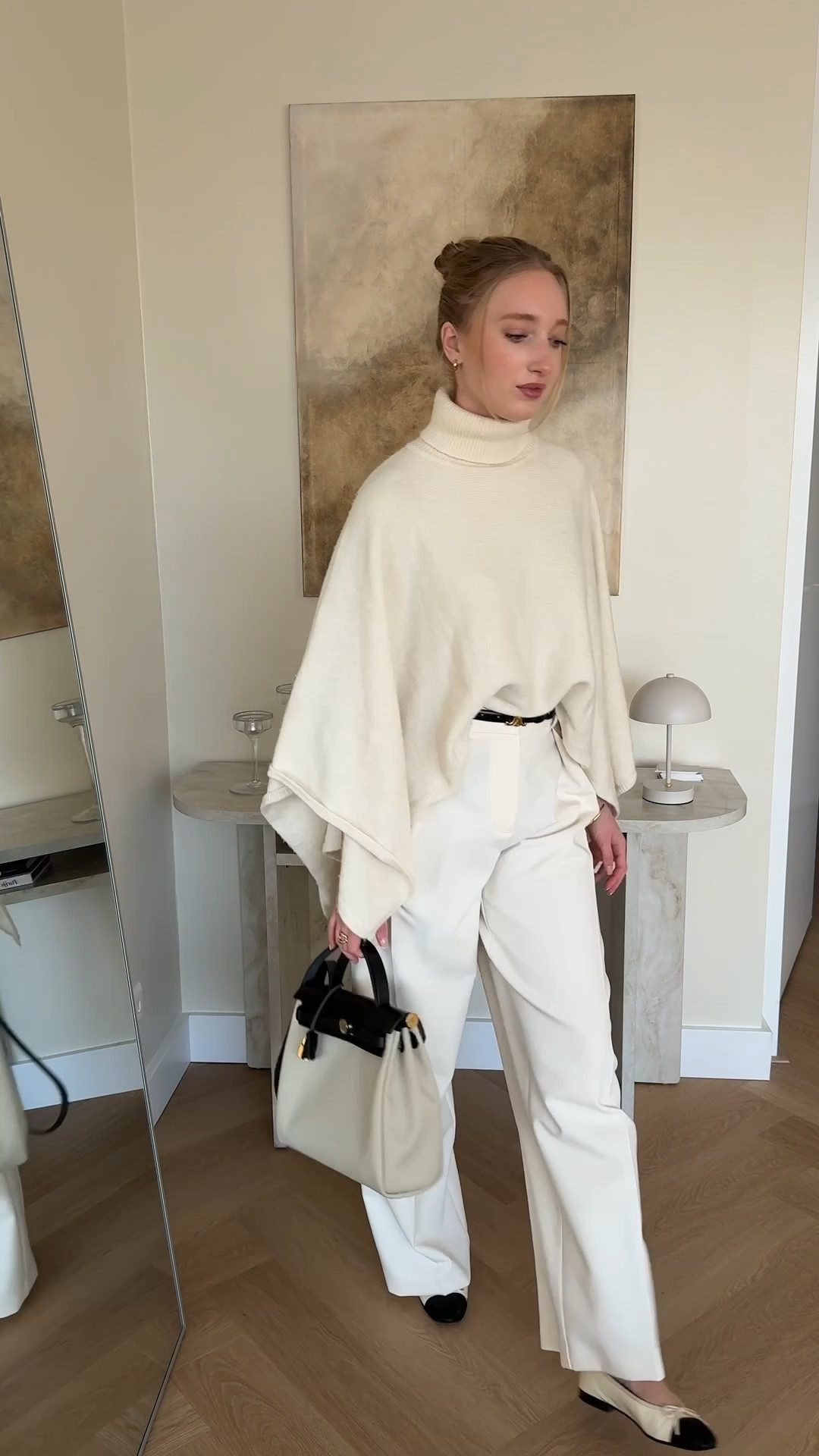 Monochrome look for everyday with white cape and wide leg trousers. Luxury combined with high street brands 

#LTKeurope #LTKstyletip #LTKwinter