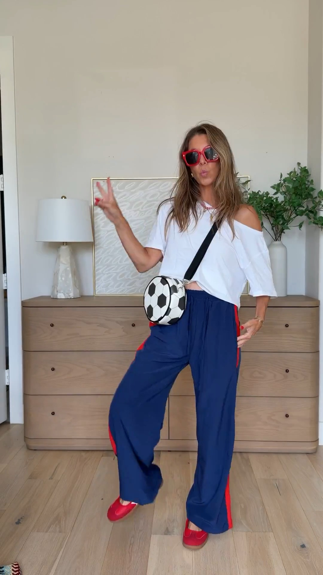 Love these Amazon track pants!! Size XS - lots of color and print options and only $29.99!!! Off the shoulder white tee is a great staple! Mary Jane sneaker look for less! Soccer ball purse old navy

#LTKSaleAlert #LTKootd #LTKfitnessgoals