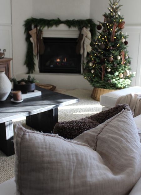 Cozy Christmas family room - pretty Sherpa throw pillows on sale all the good neutrals! 

#LTKHoliday #LTKhome #LTKSeasonal