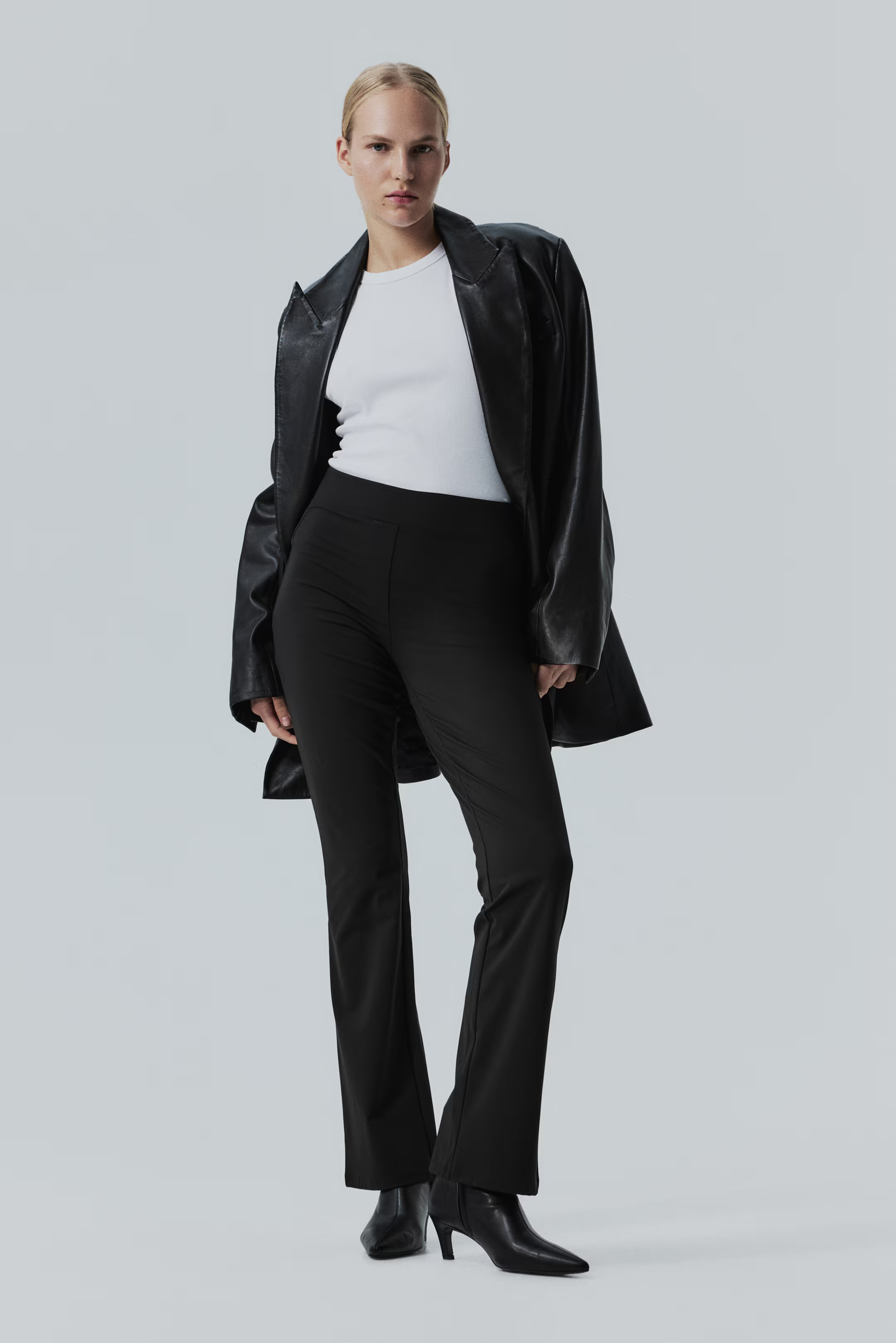 Four-way Stretch Flared Trousers - Black - Ladies | H&M GB | H&M (UK, MY, IN, SG, PH, TW, HK)